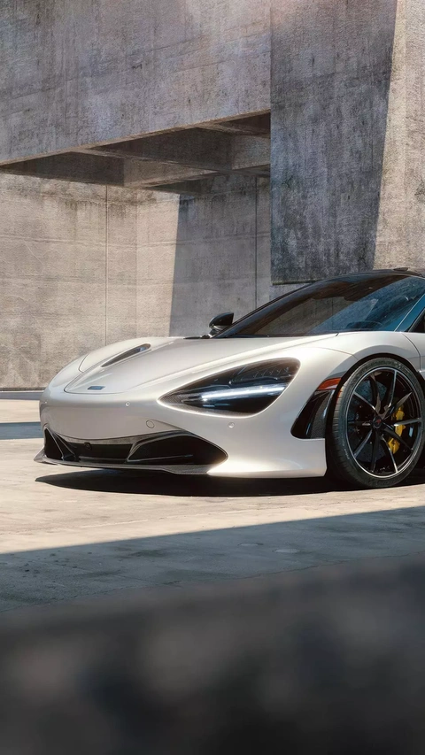 Silver McLaren Supercar Parked Outdoors