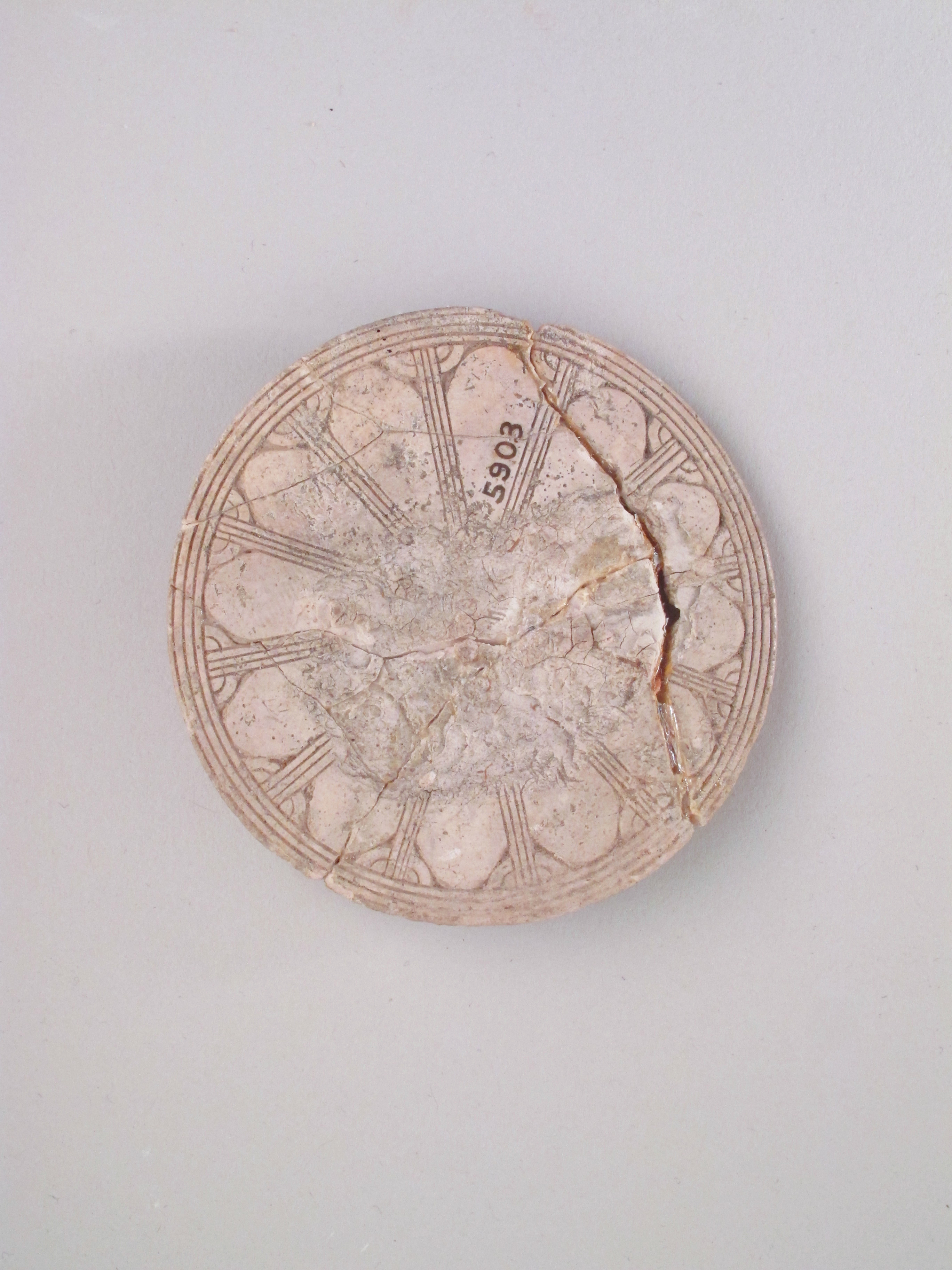 Broken Carved Circular Ancient Artifact