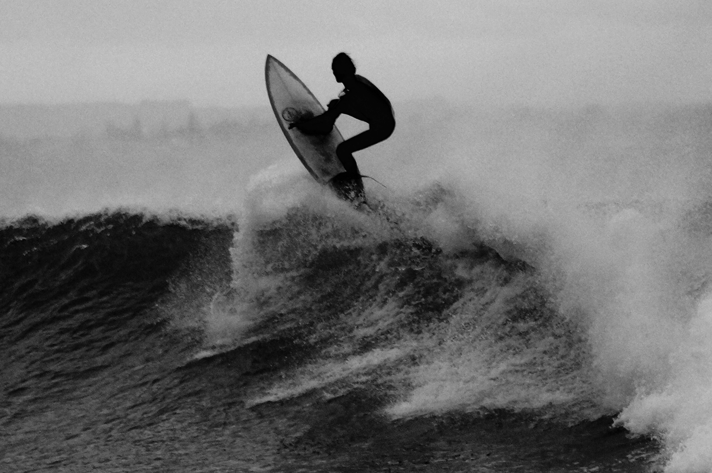 Surfer Riding Ocean Wave