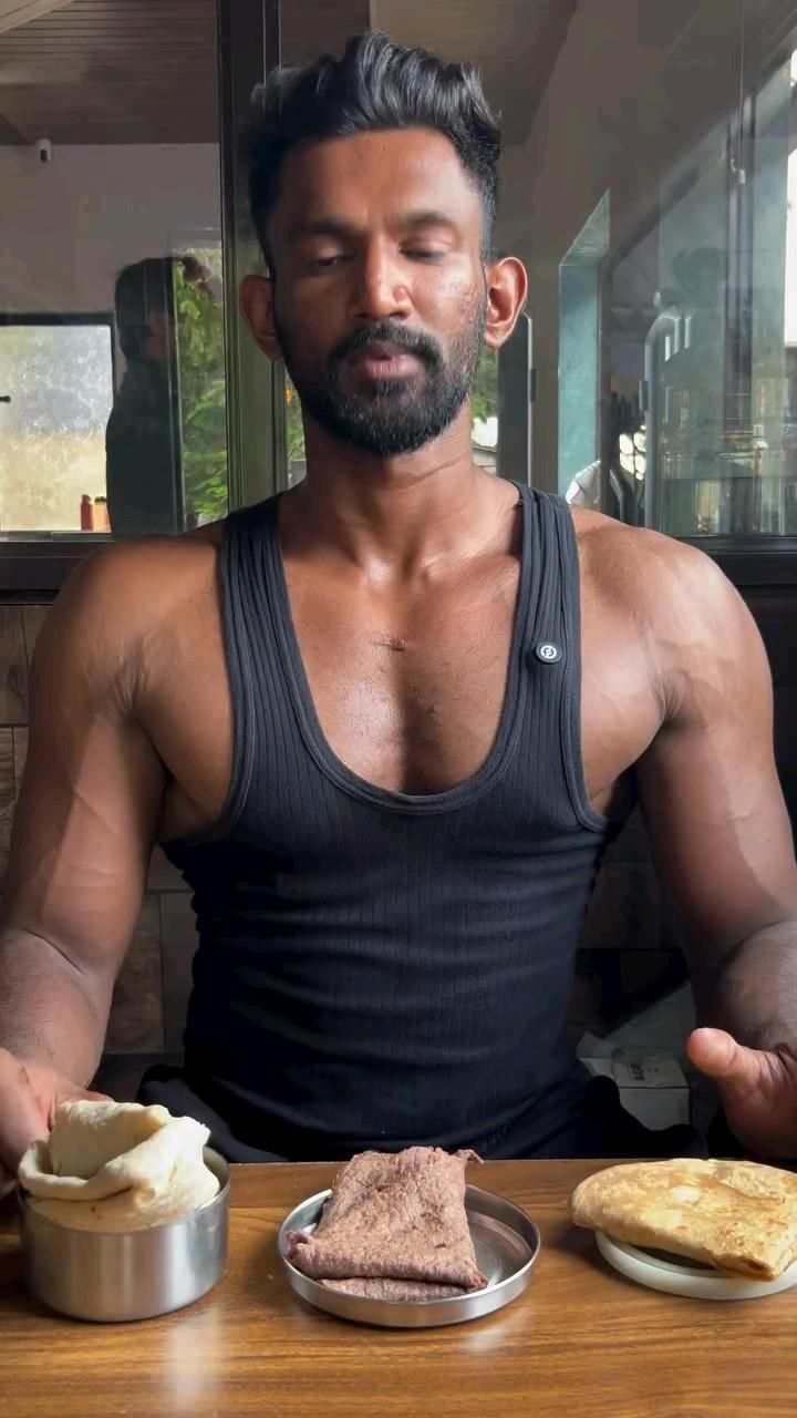 Muscular Man With Assorted Flatbreads