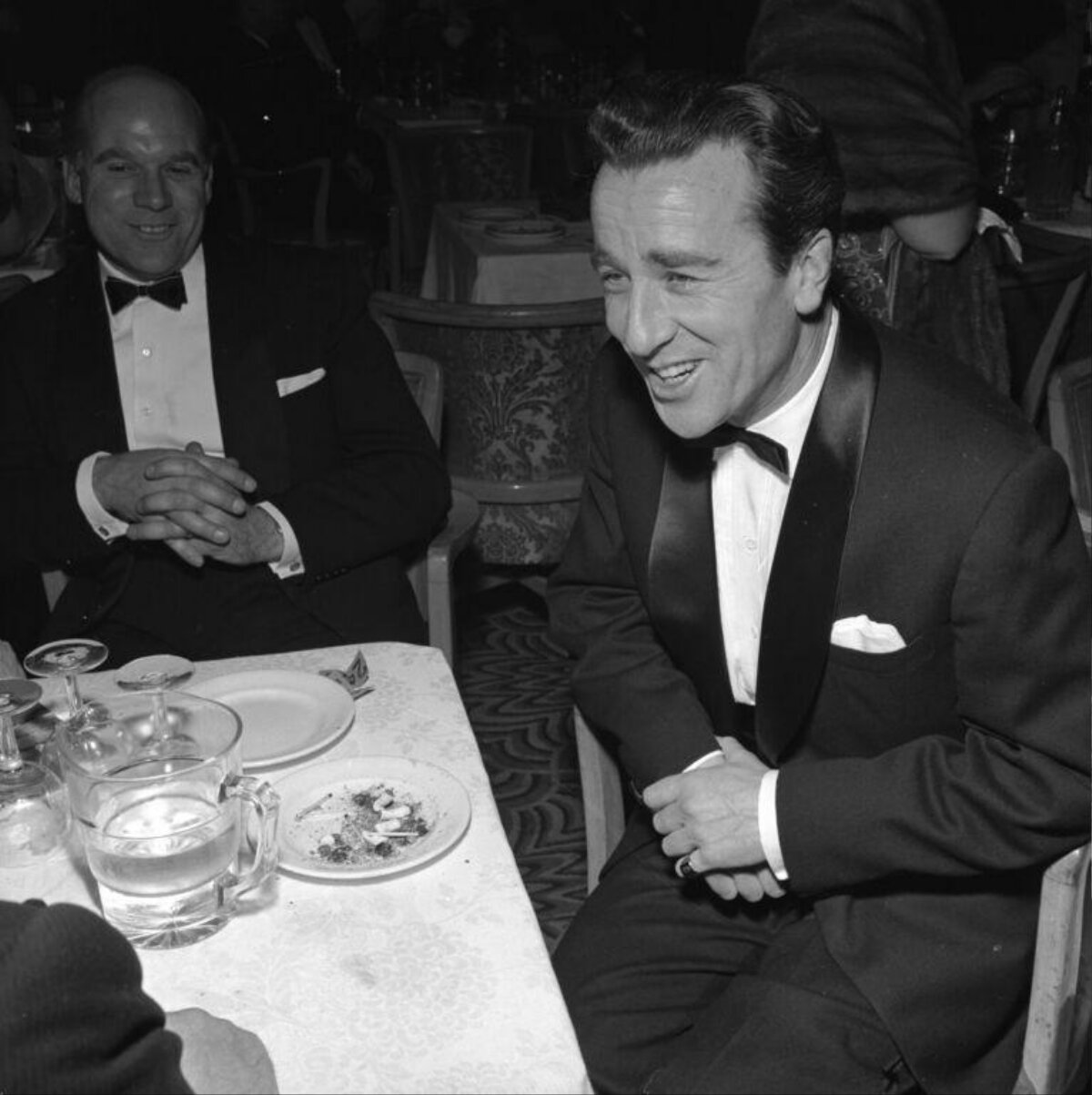 Two Men In Tuxedos At Formal Dinner