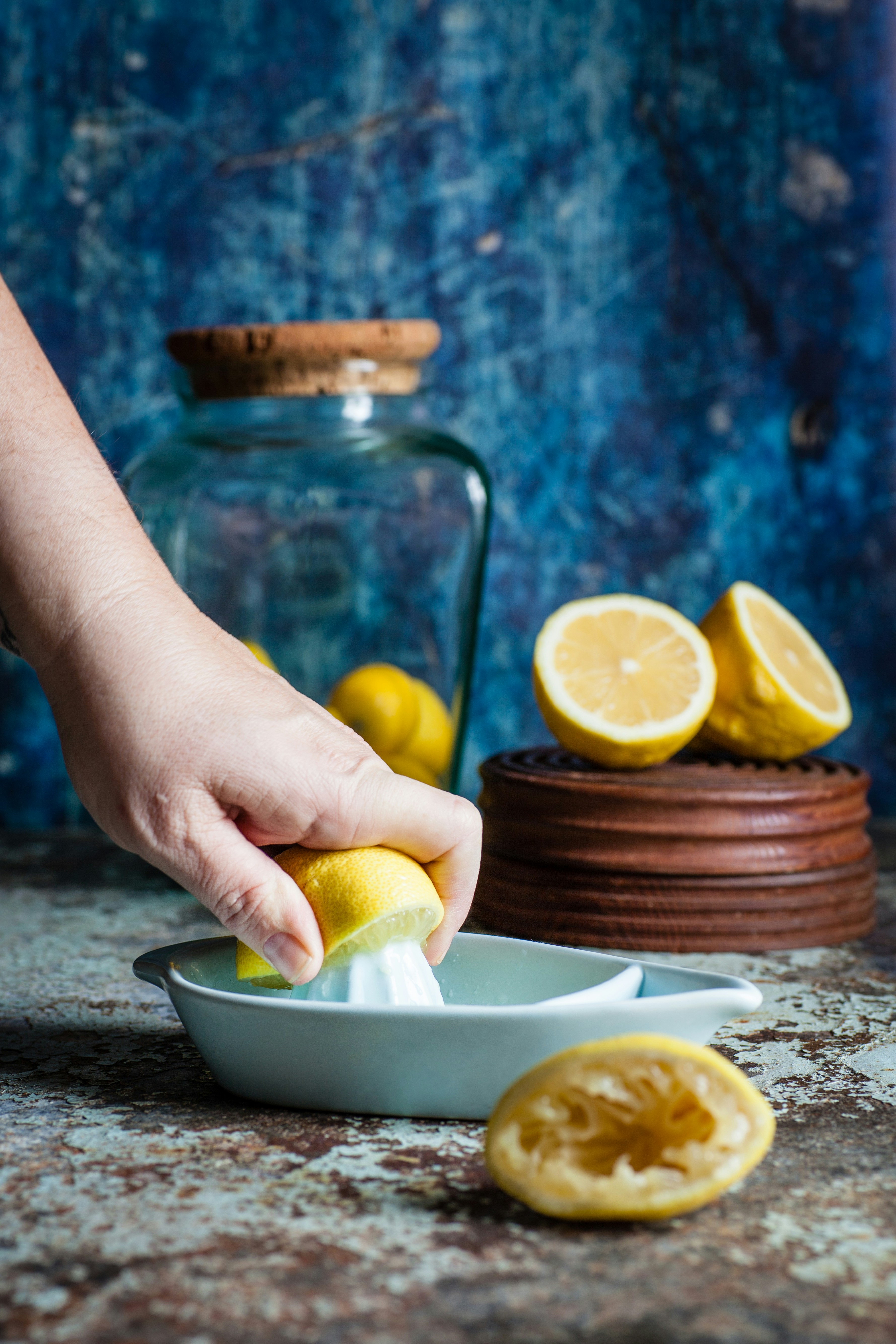 Hand Squeezing Fresh Lemon