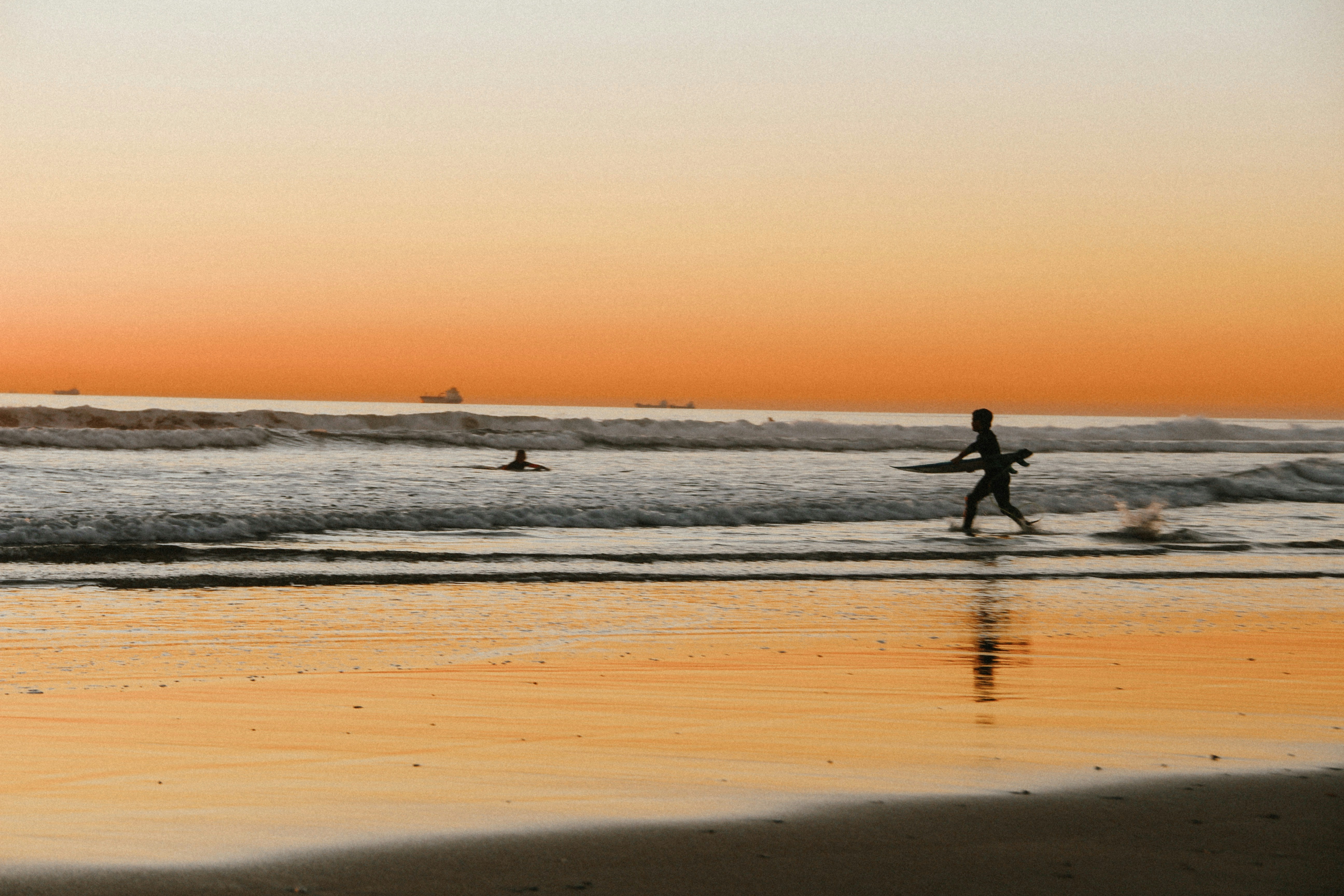 Surfers at Sunset Beach