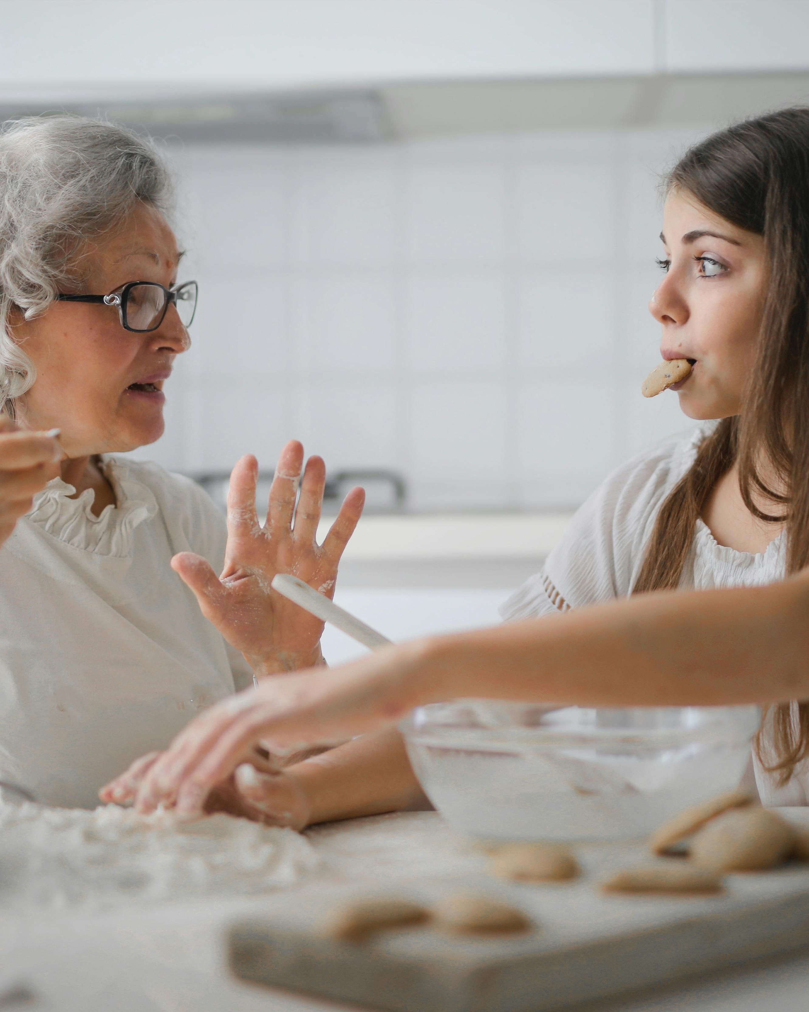 Grandmother and Granddaughter Baking Cookies