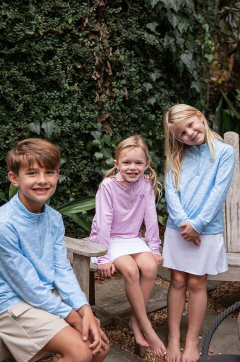 Three Children Posing Outdoors