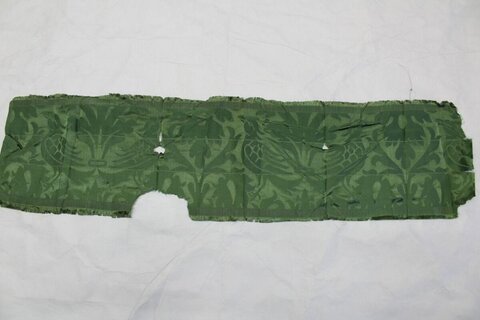 Damaged Green Patterned Fabric Fragment