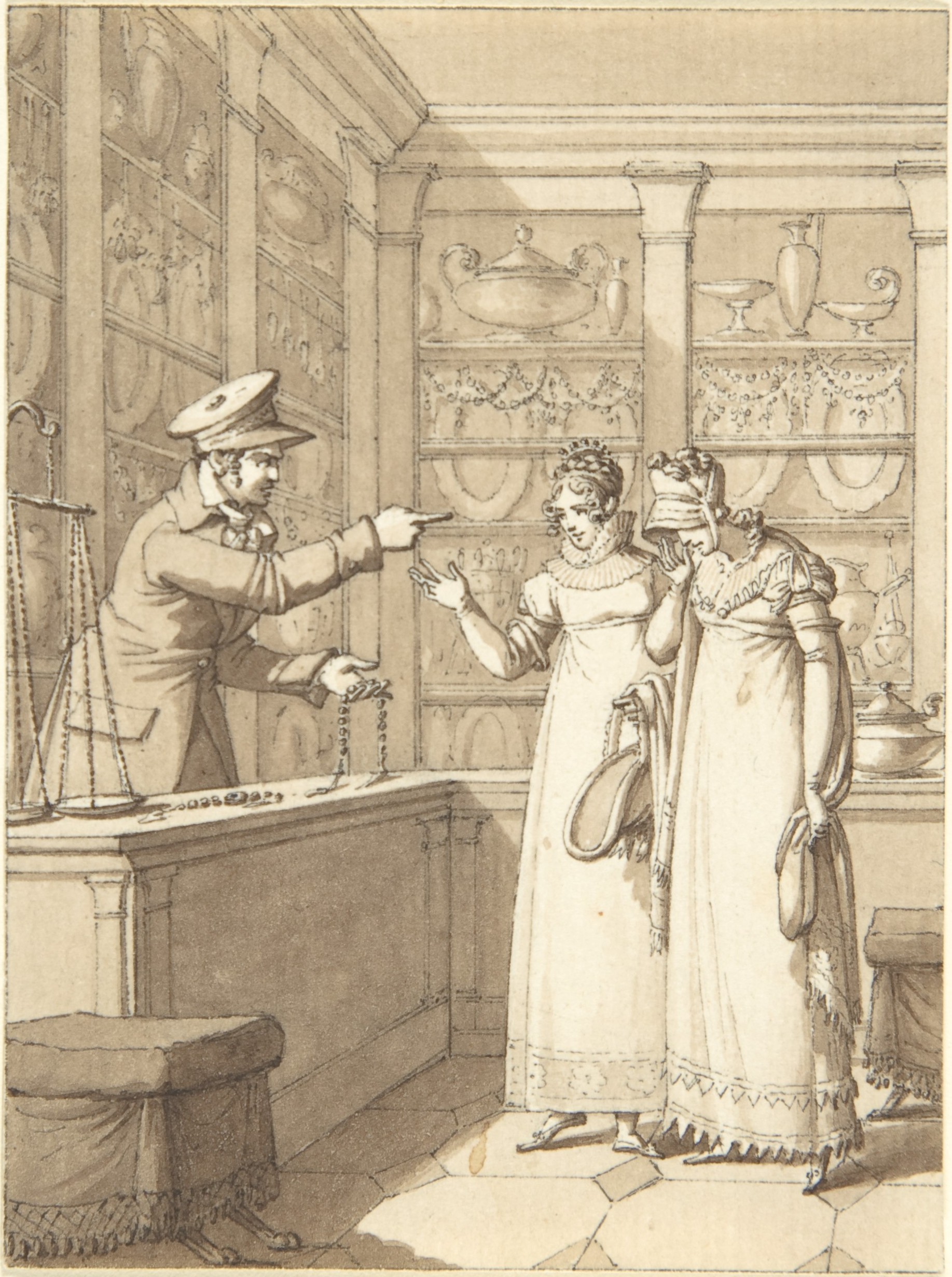 Jeweler Showing Jewelry to Two Customers