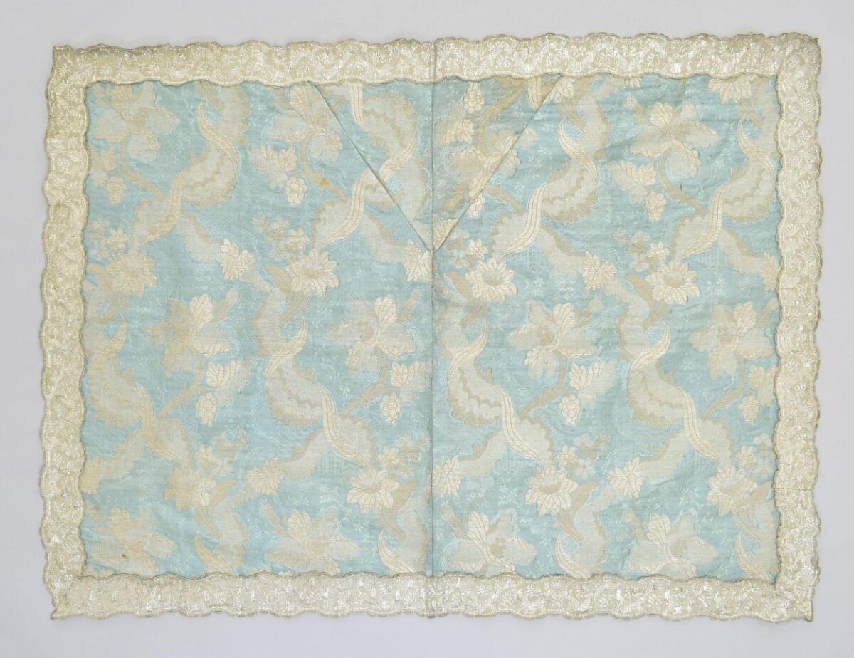 Light Blue Floral Textile with Lace Trim