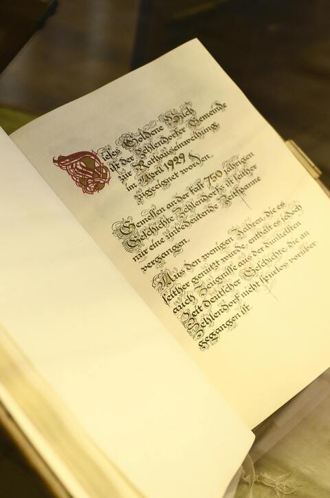 Open Book with German Gothic Calligraphy