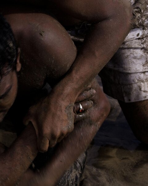 Close Up of Muddy Wrestling