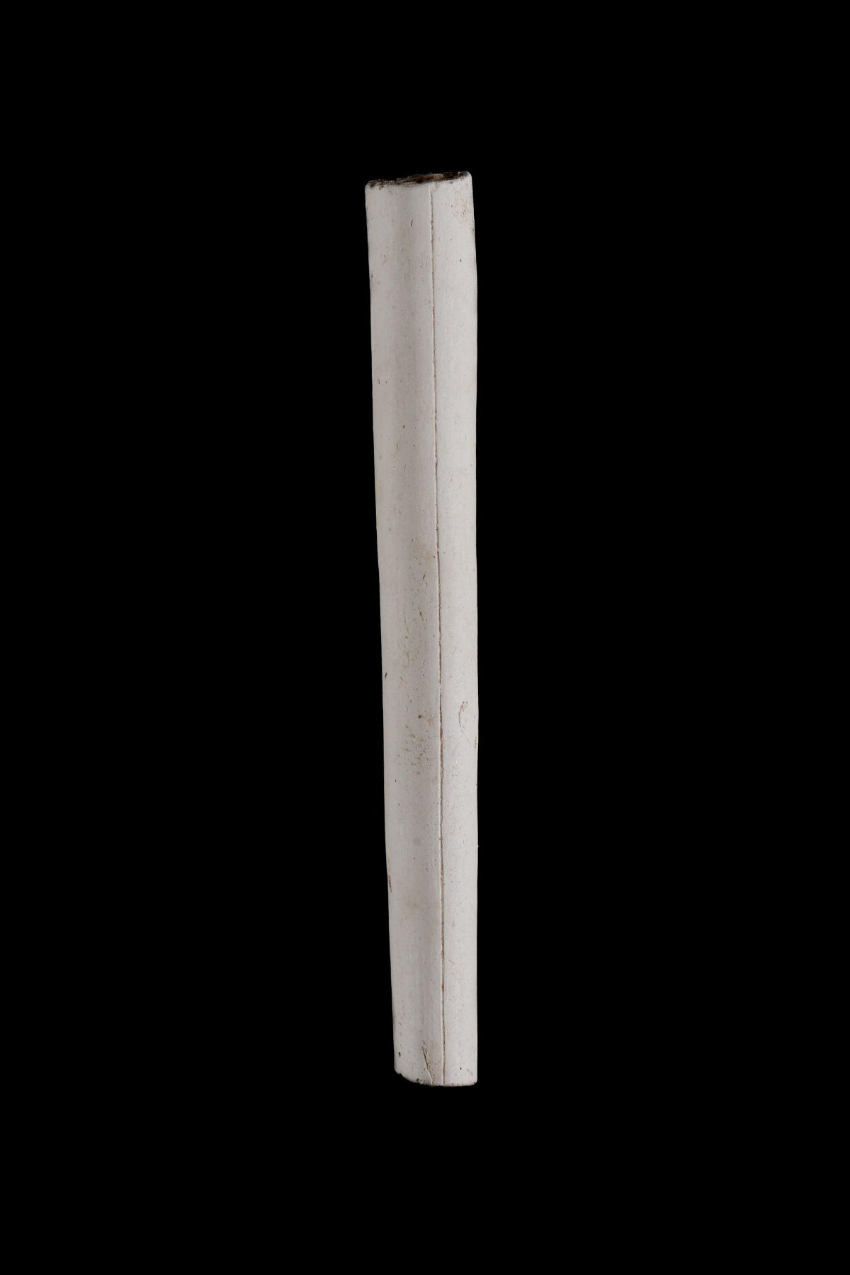 White Cylindrical Object on Black Background