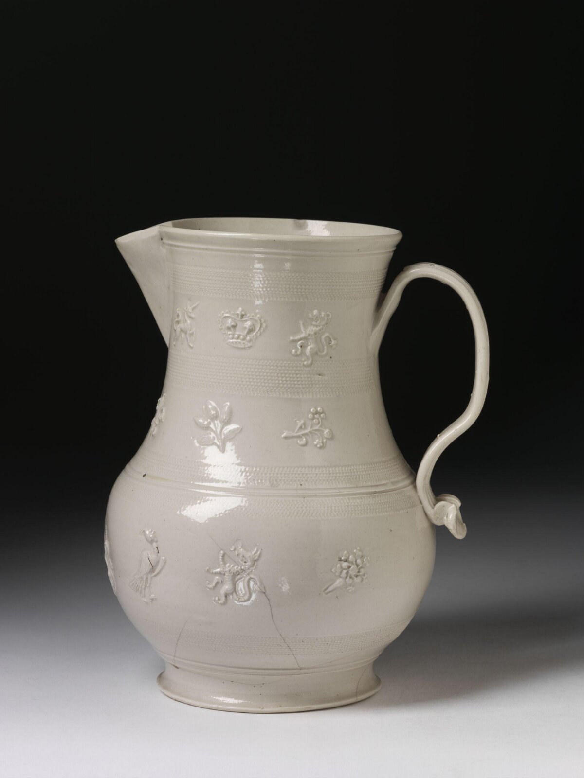 Cream Embossed Ceramic Pitcher