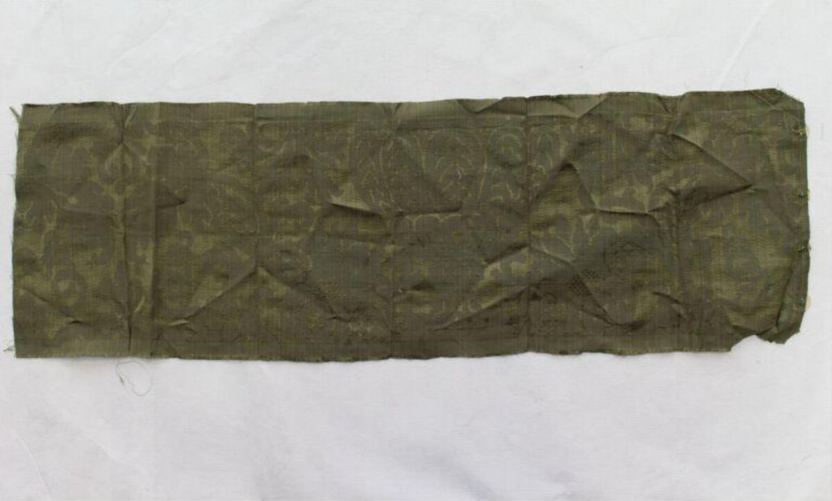 Green Patterned Fabric Fragment