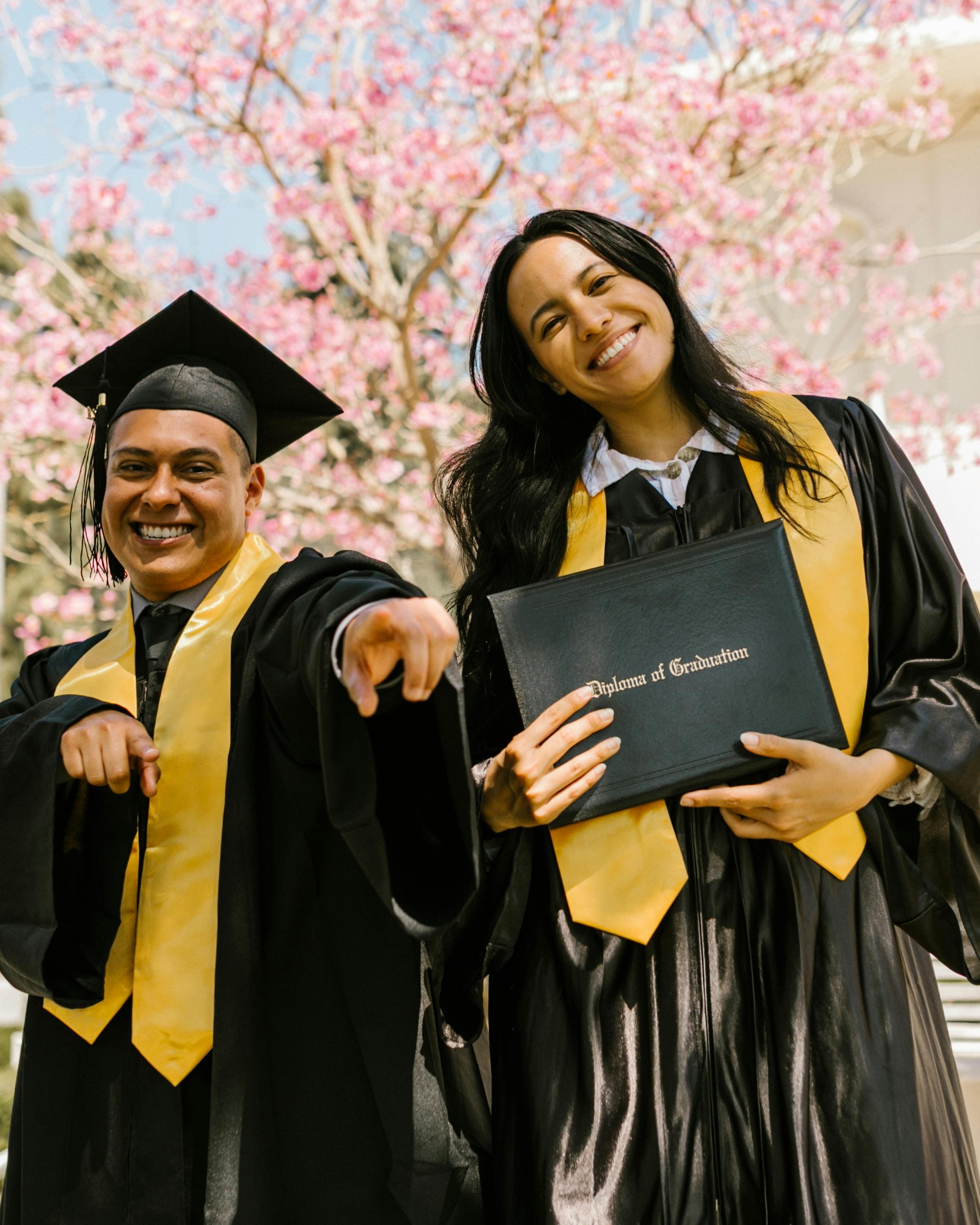 Two Graduates Celebrating Graduation