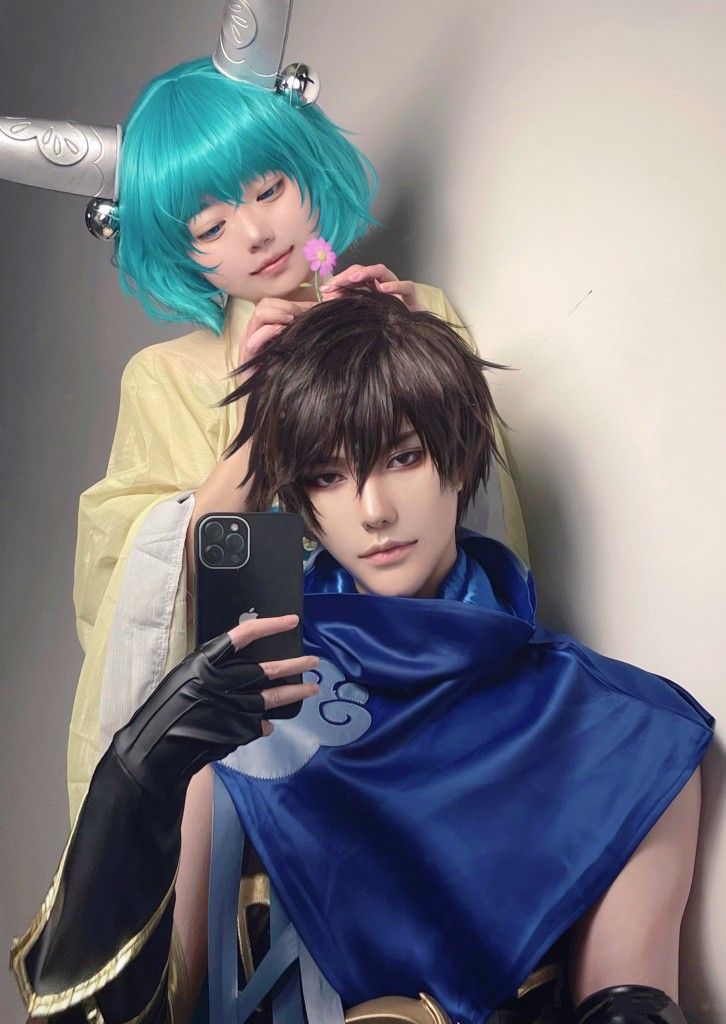 Two Cosplayers Taking Mirror Selfie