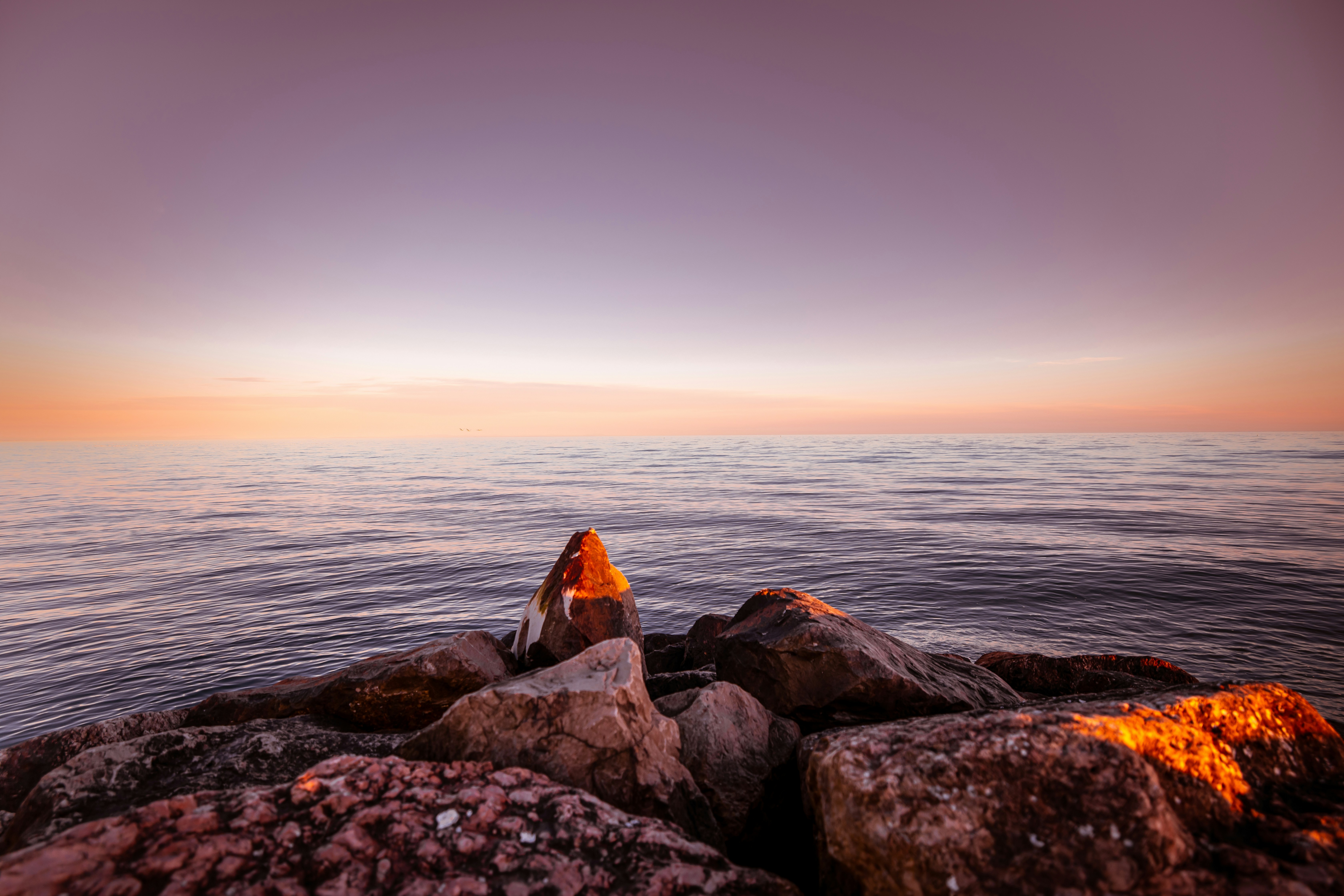 Sunset Sea View From Rocky Shore