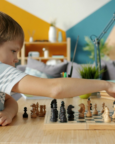Young Boy Playing Chess