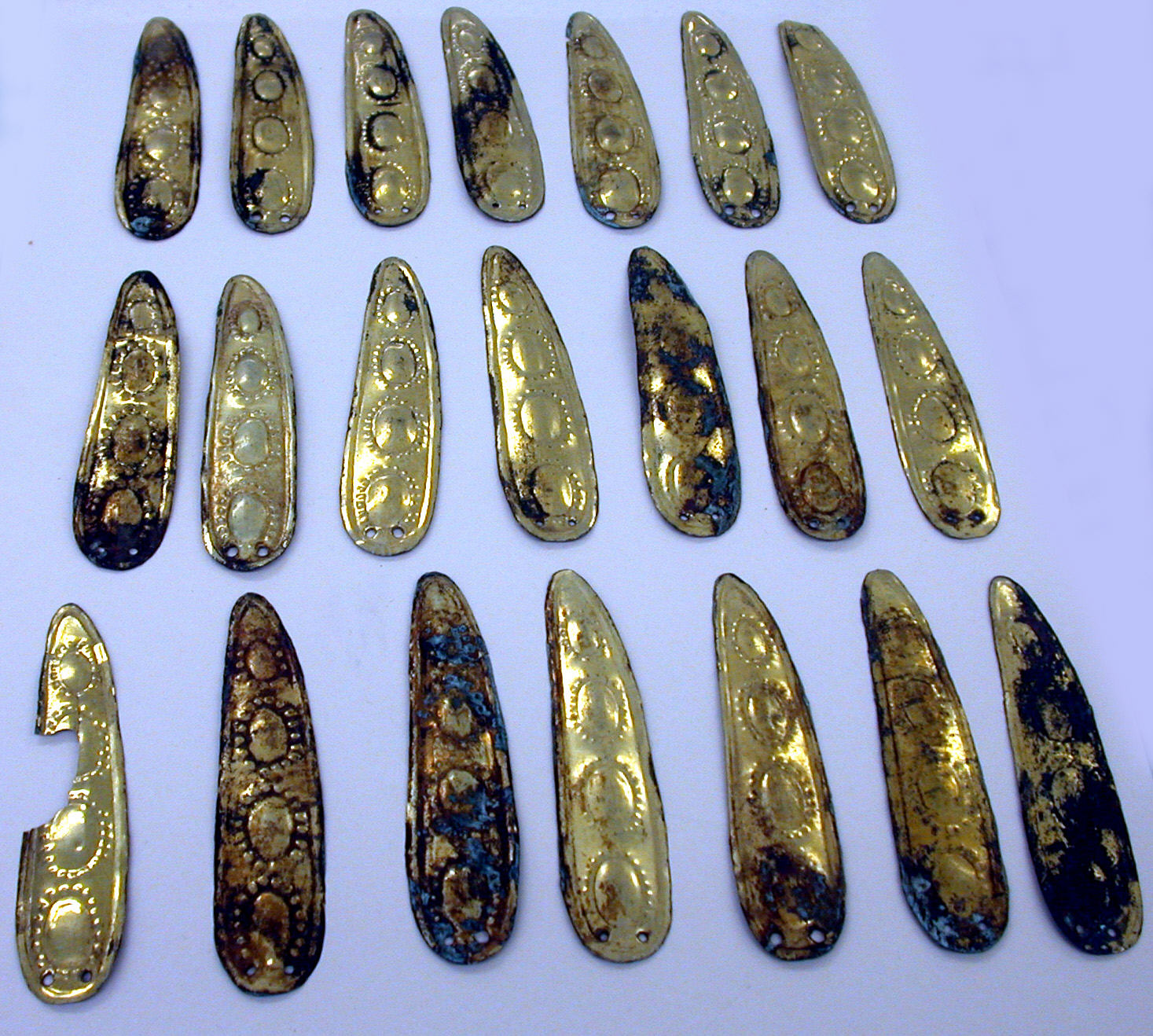 Arranged Ancient Gilded Bronze Ornaments
