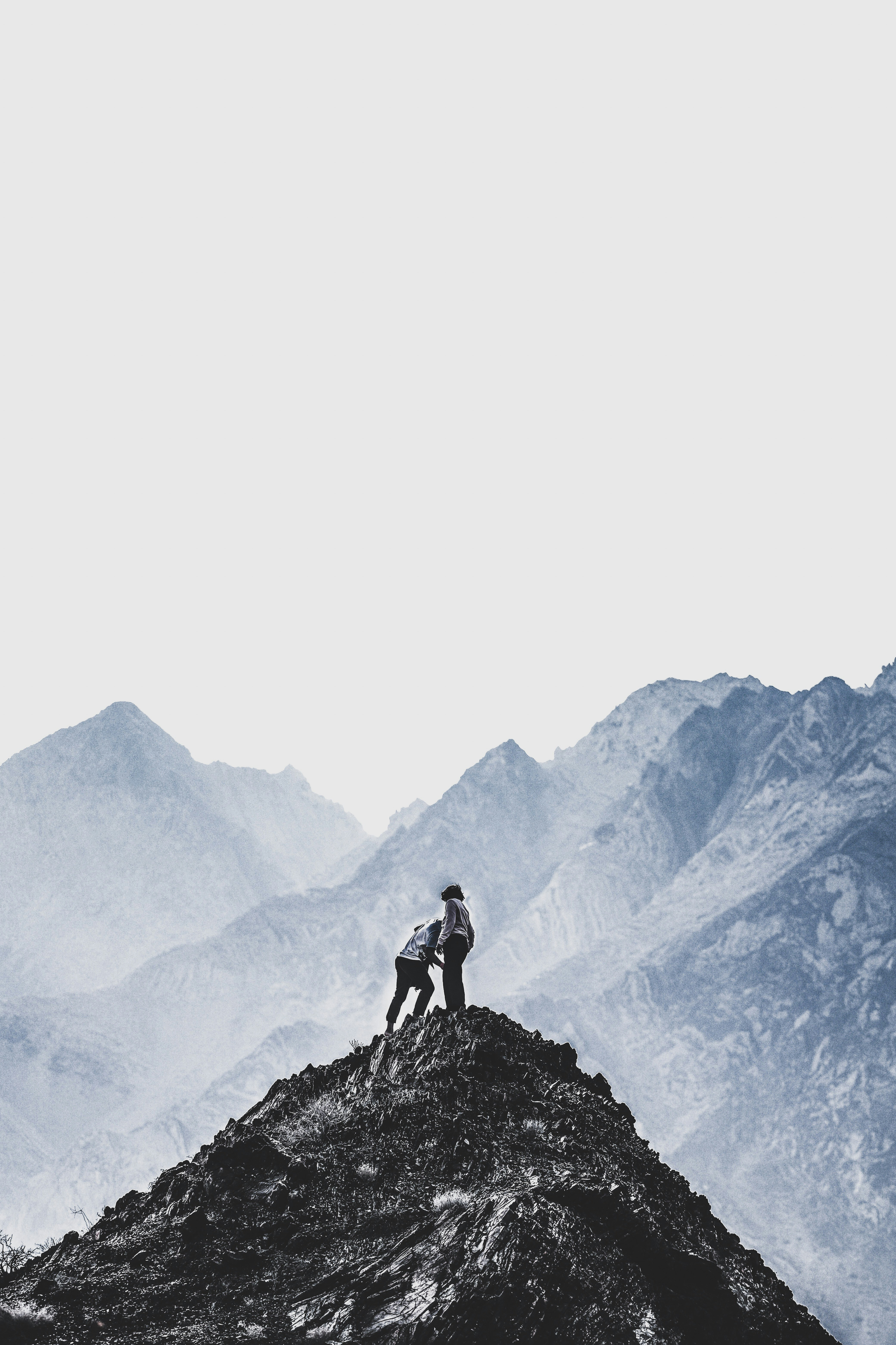 Two Climbers on Mountain Peak