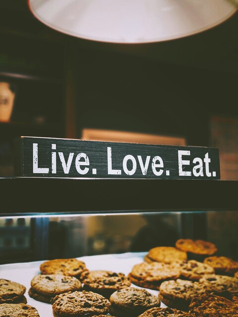 Live Love Eat Sign Over Cookie Display