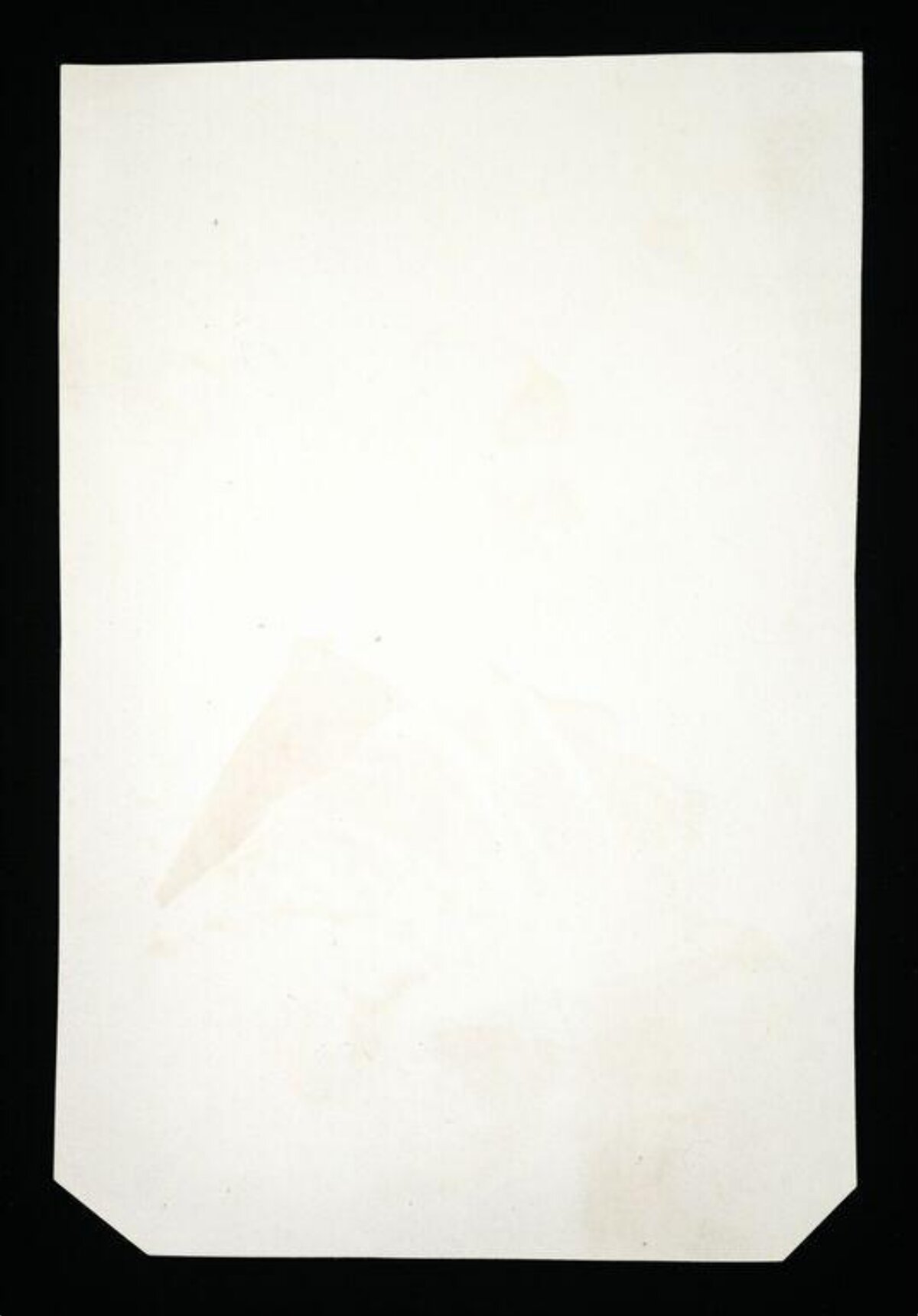 Blank Paper Sheet on Black Background