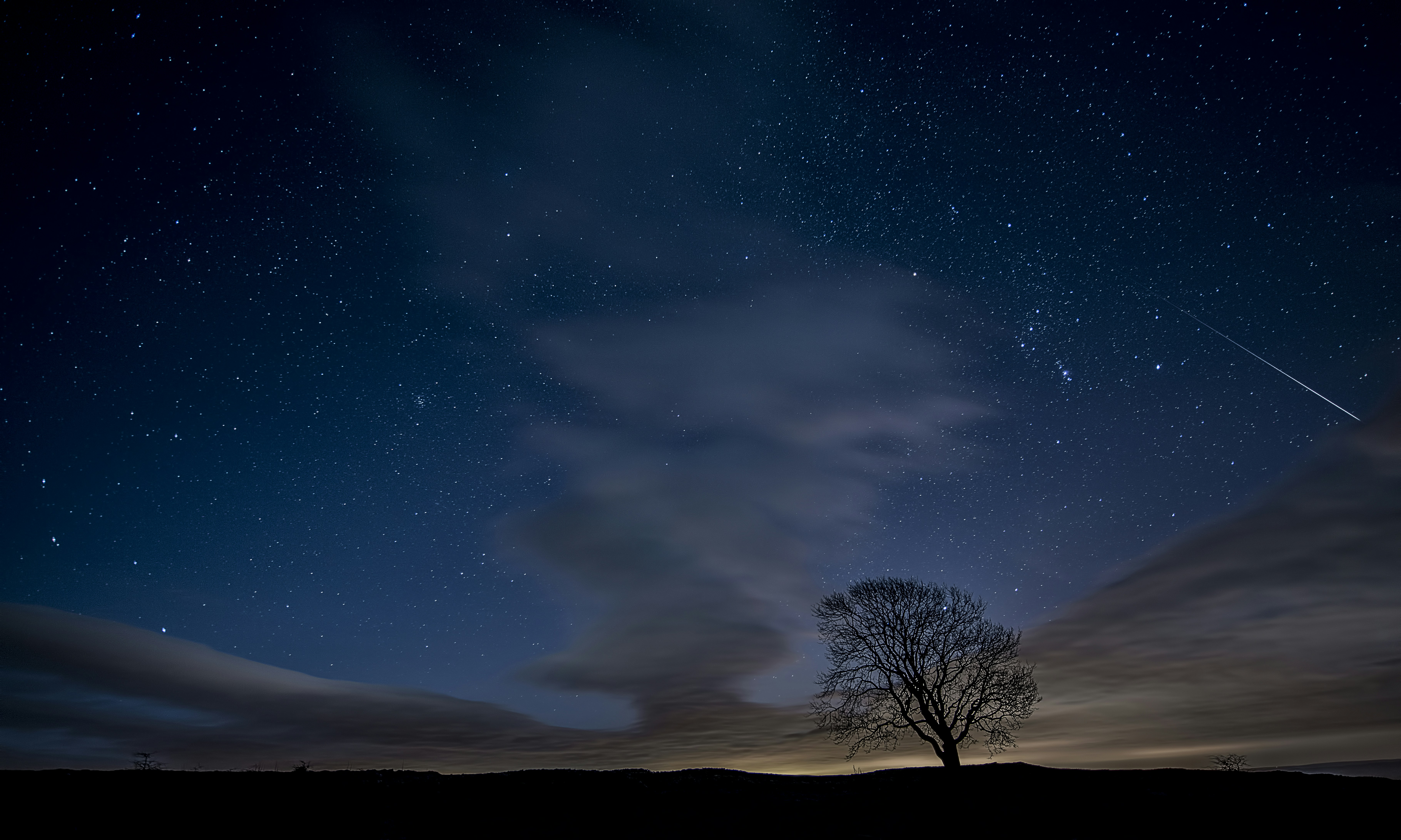 Meteor Over Starry Night Sky