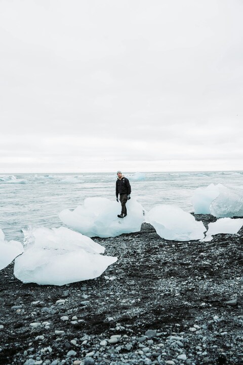 Man on Ice at Black Sand Beach