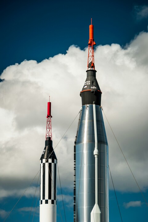 Two US Rockets Under Cloudy Blue Sky