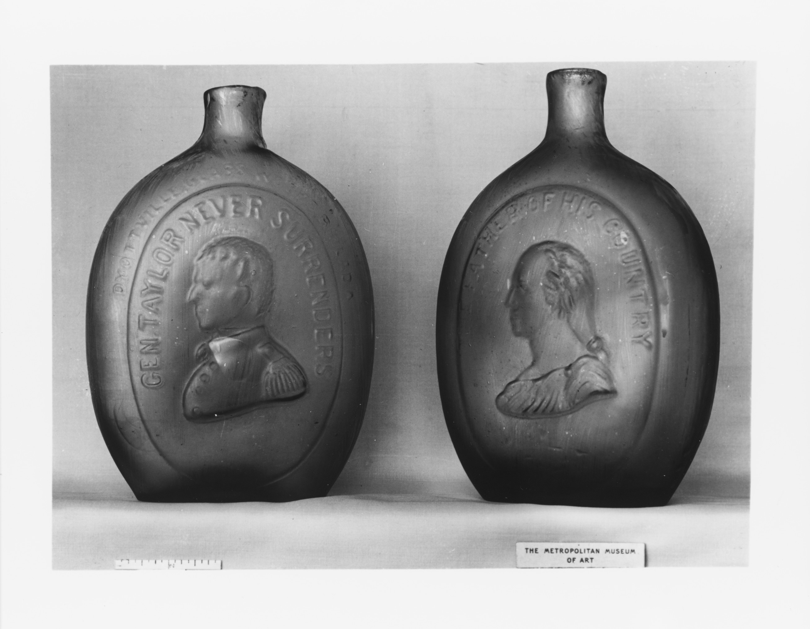 Two Commemorative Historical Glass Flasks
