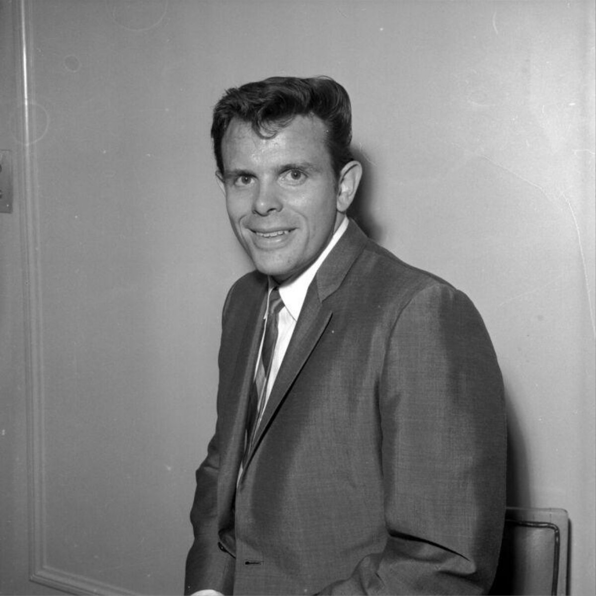 Smiling Man in Suit Studio Portrait