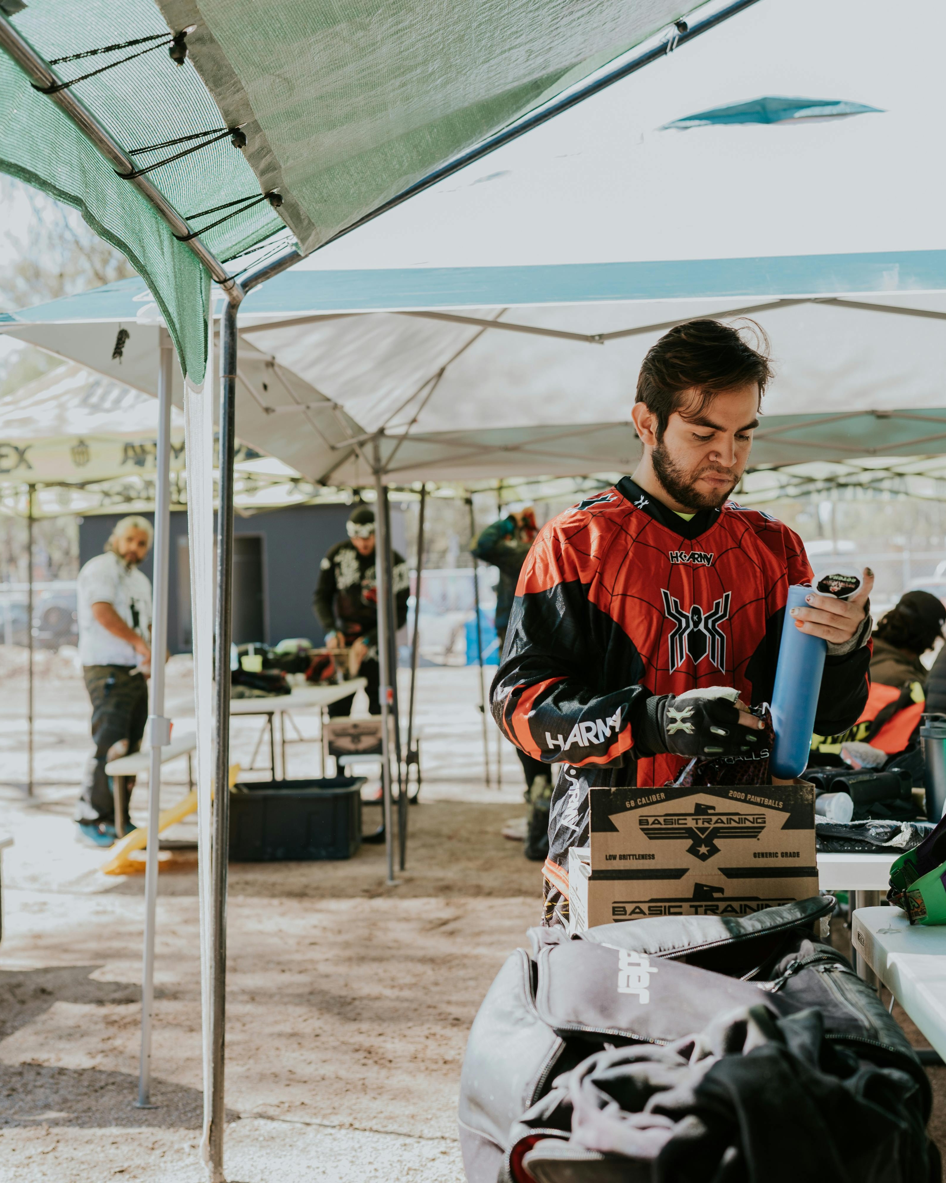 Paintball Player Preparing Gear