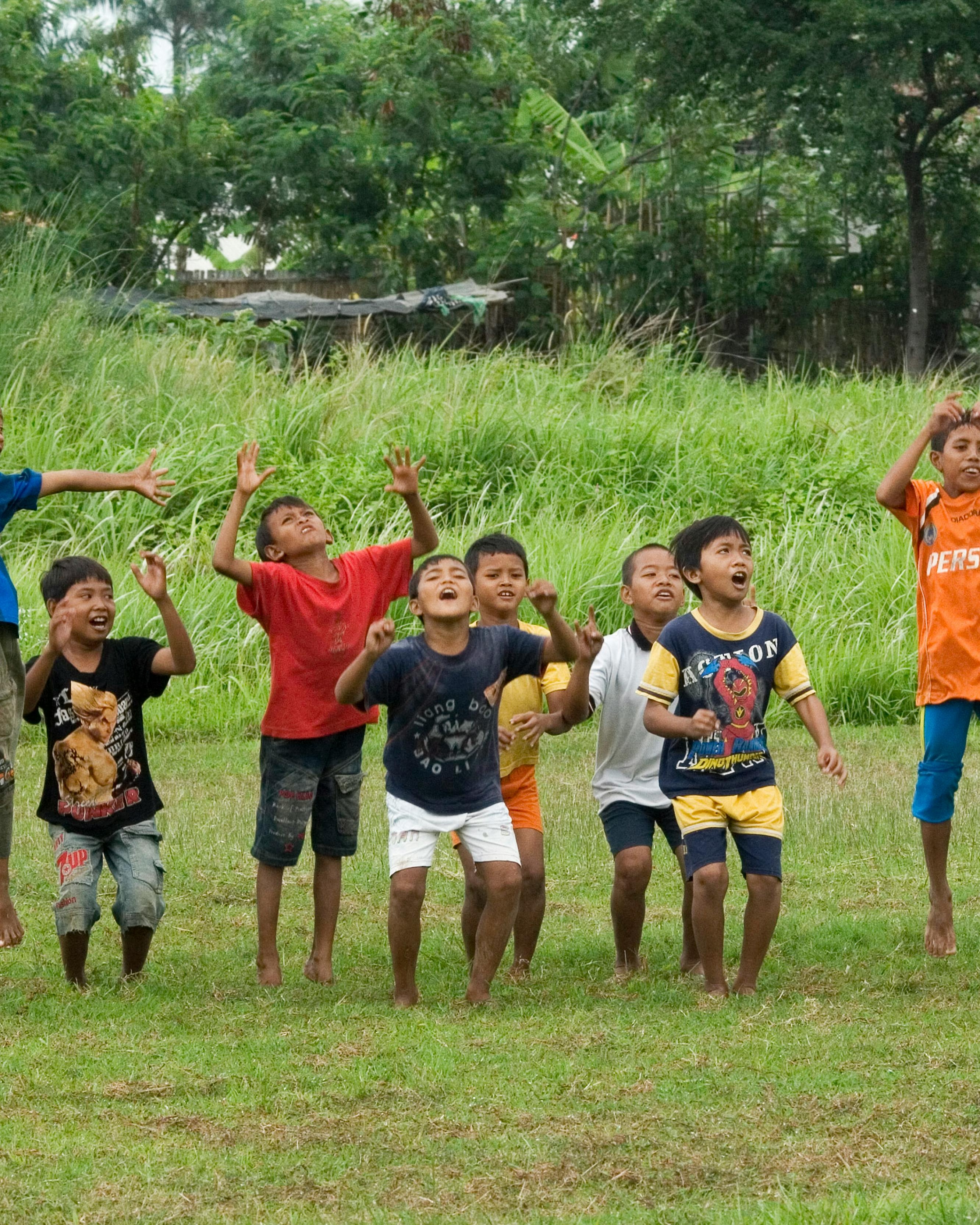 Group of Children Playing Outdoors