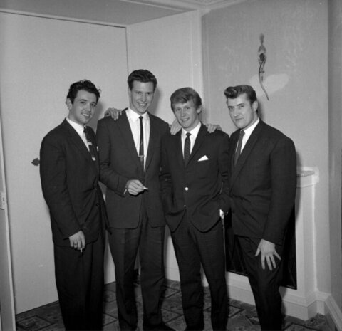 Four Men in Suits Group Portrait