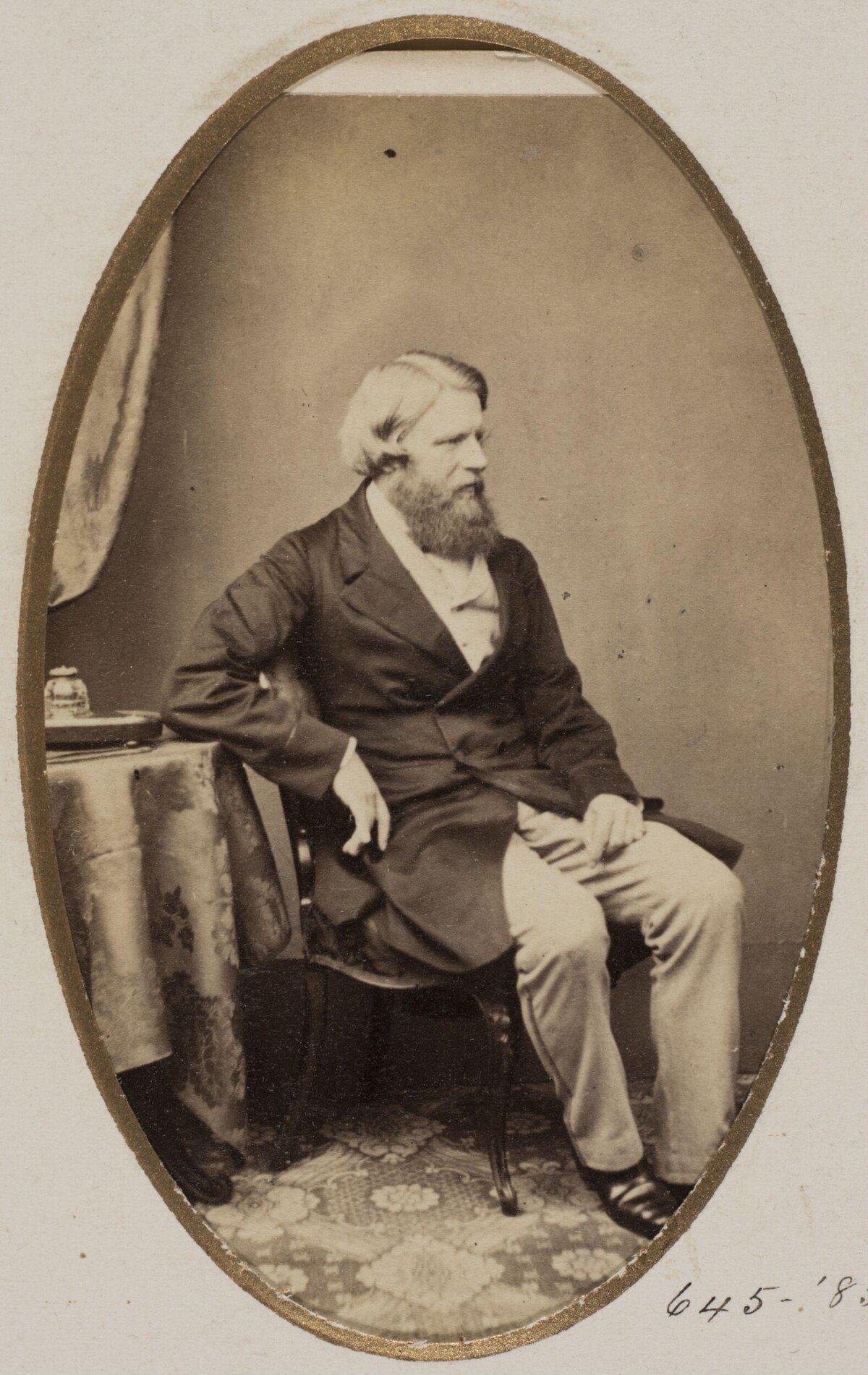 Vintage Oval Portrait of Seated Man