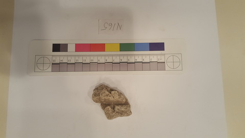 Archaeological stone sample with scale