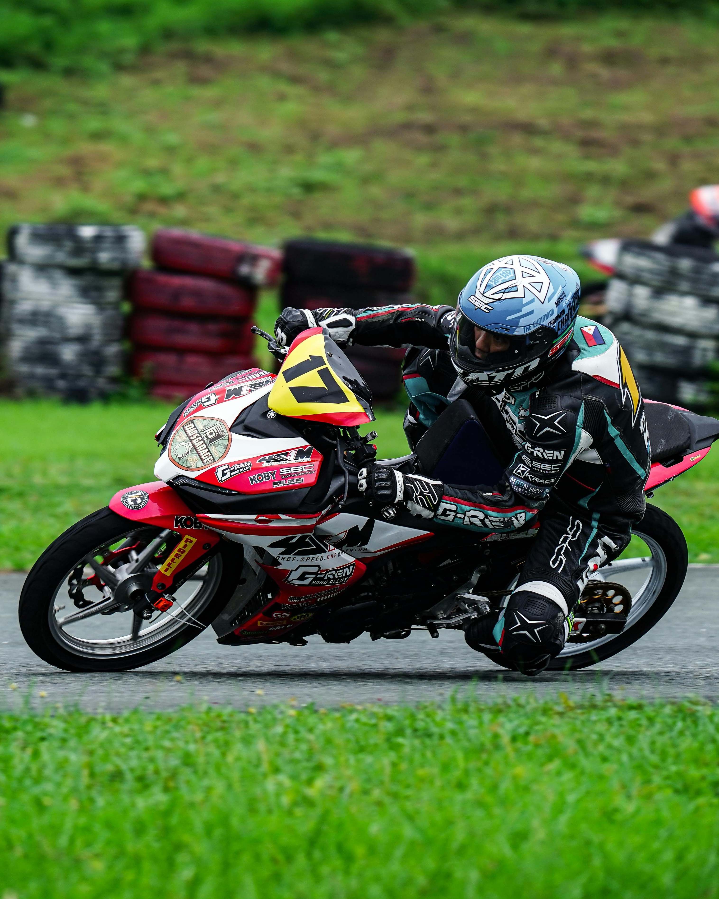 Motorcycle Racer Cornering on Race Track