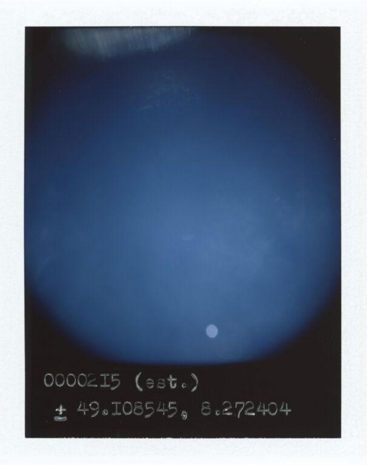 Polaroid Photo of Sun and Blue Sky