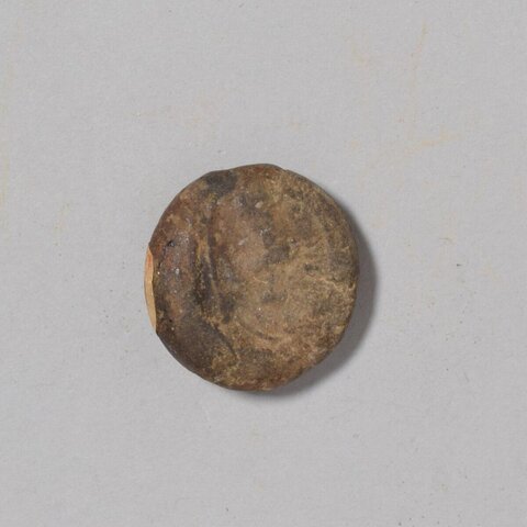 Ancient Round Clay Artifact