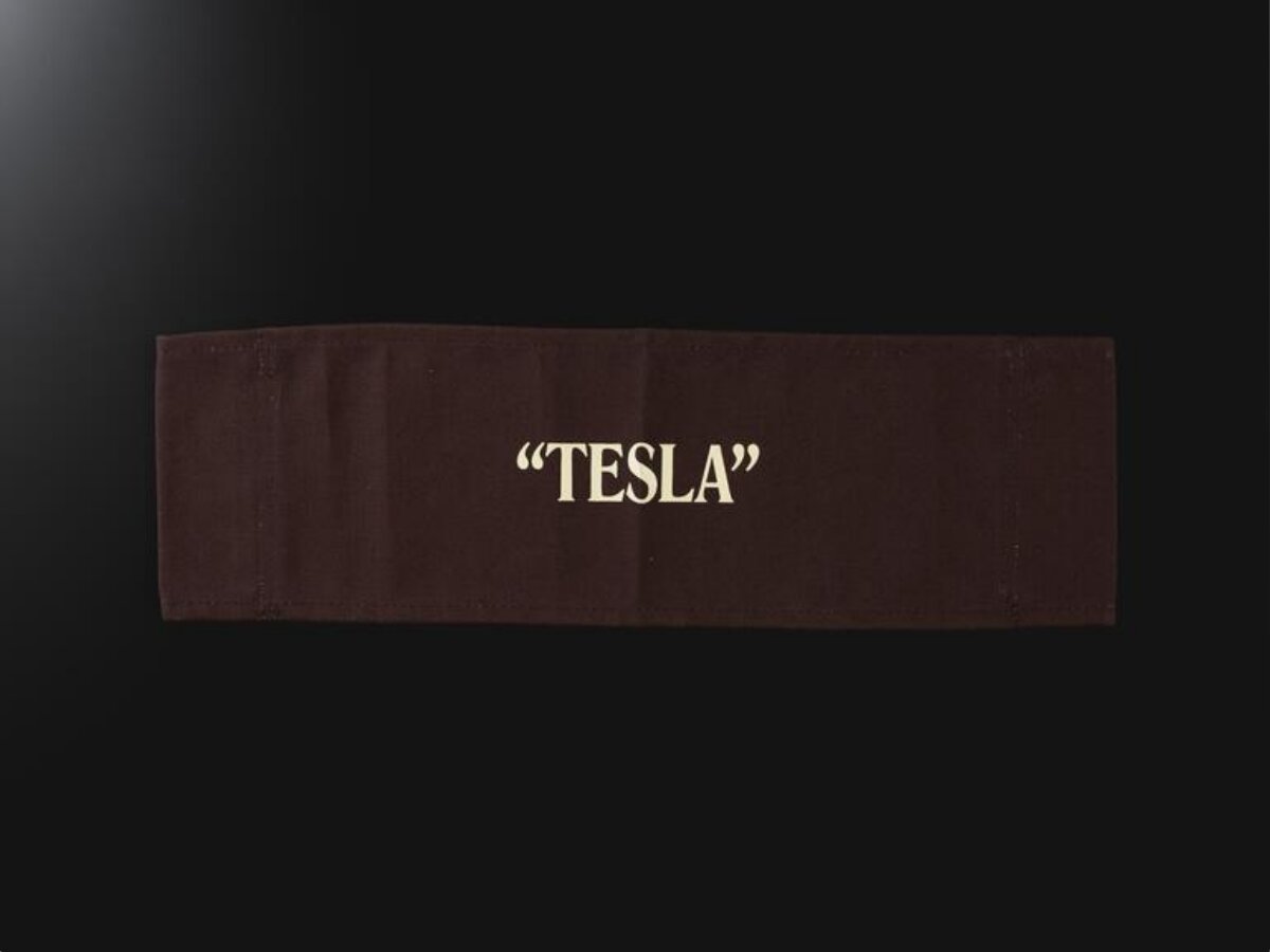 Brown Fabric Tesla Brand Label