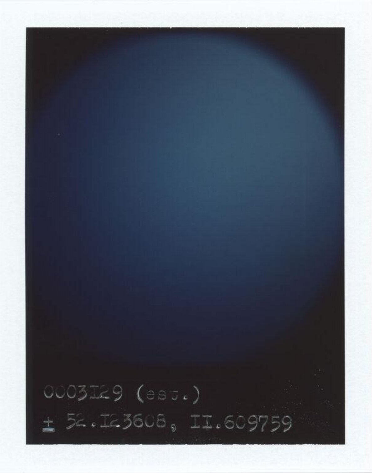 Polaroid With Handwritten Coordinates