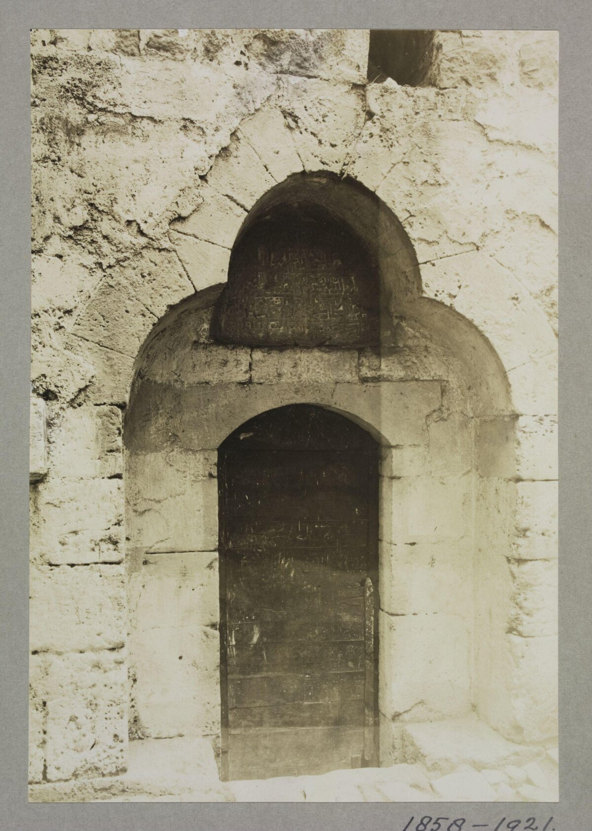 Vintage Inscribed Arched Stone Doorway — Architecture Encyclopedia