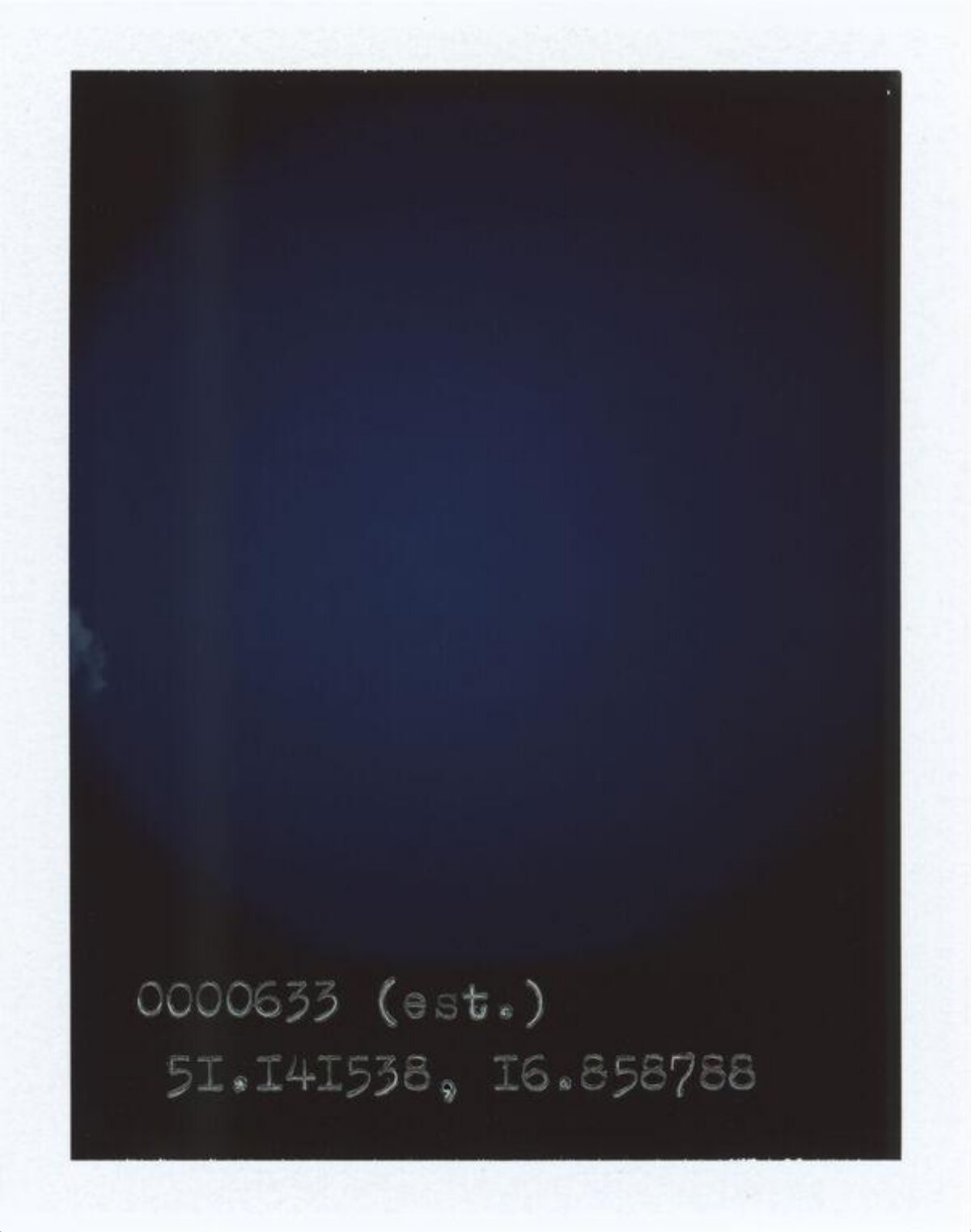Handwritten Coordinates on Dark Background