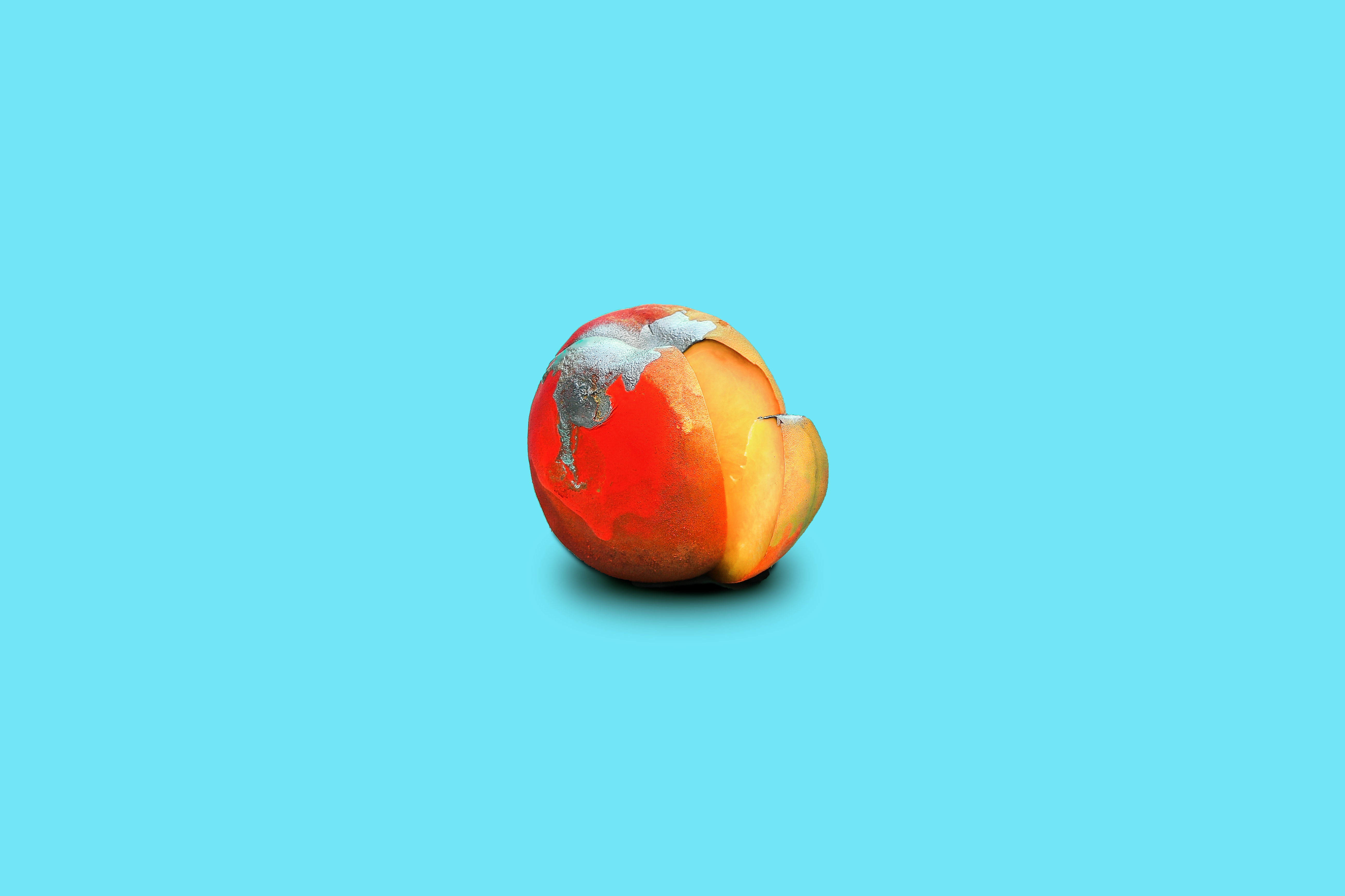 Damaged Mutated Peach on Blue Background