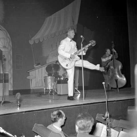 Guitarist Performing on Stage