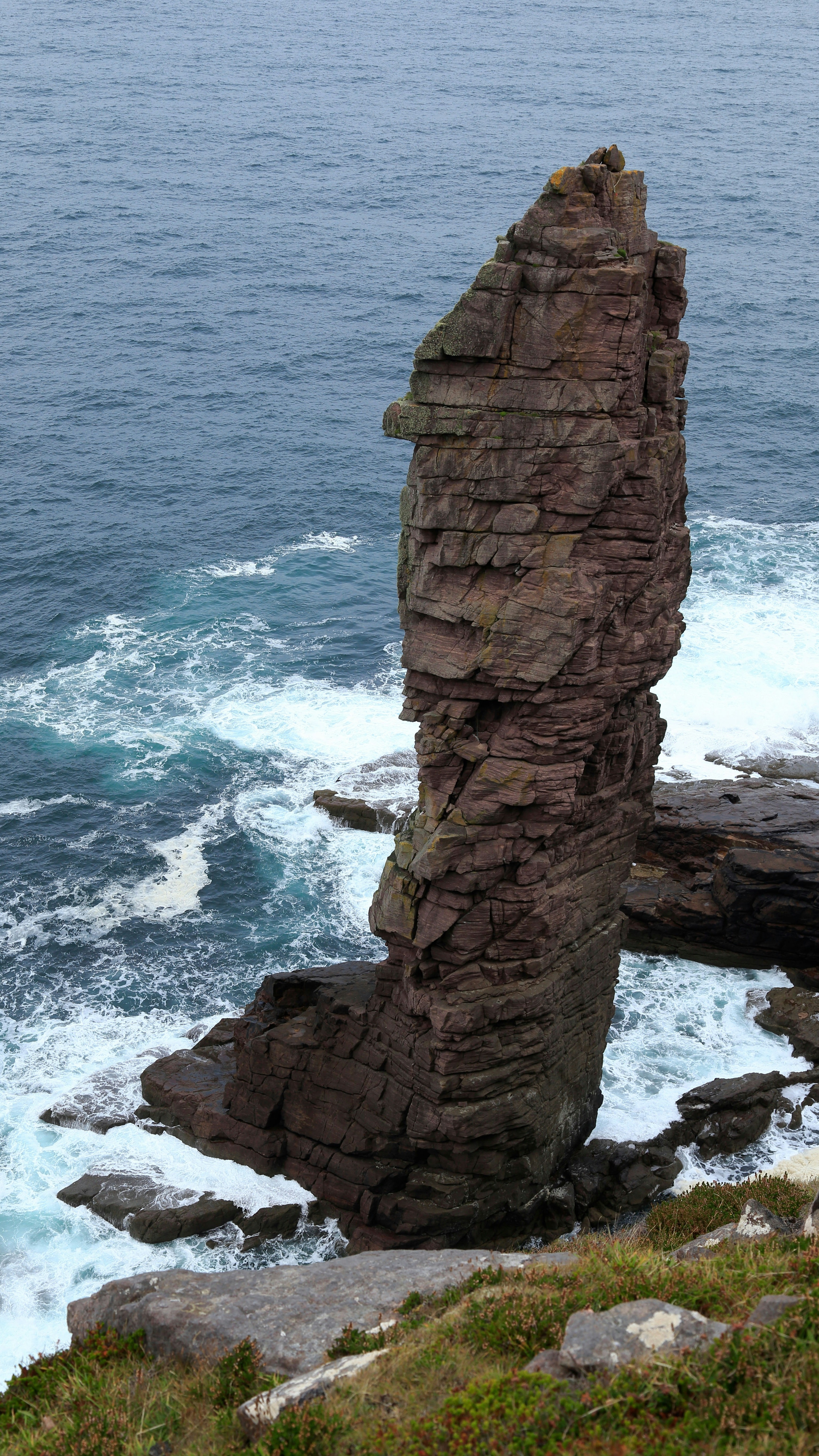 Tall Sea Stack in Rough Ocean