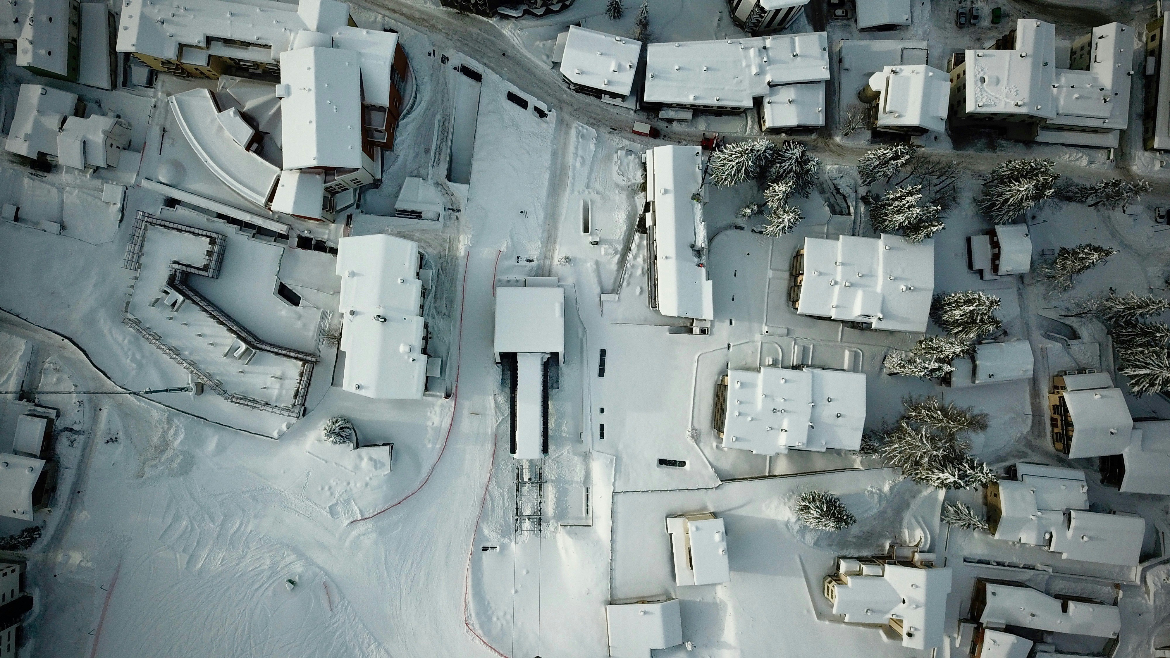 Aerial View of Snow-covered Village