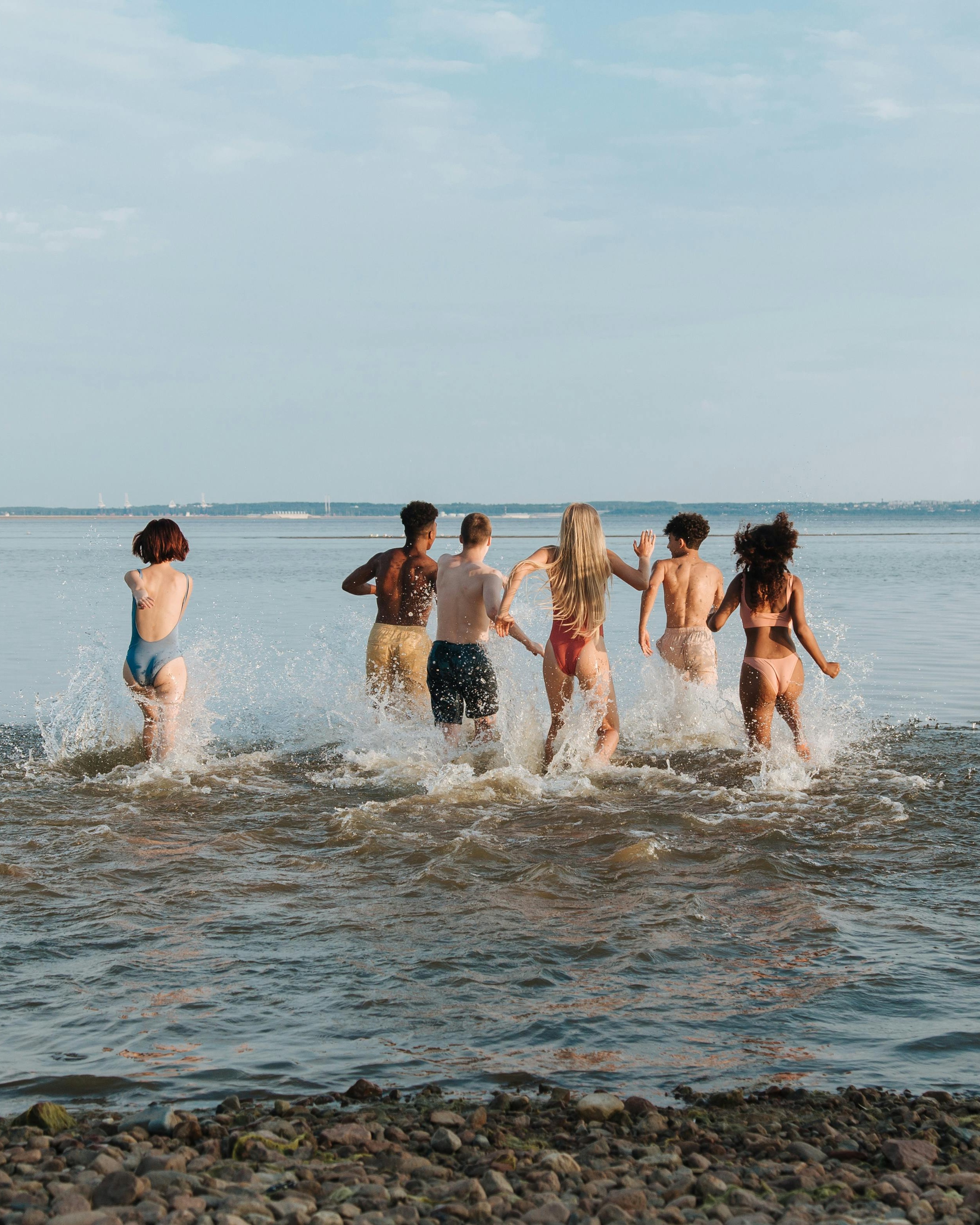 Six Friends Running Into The Sea