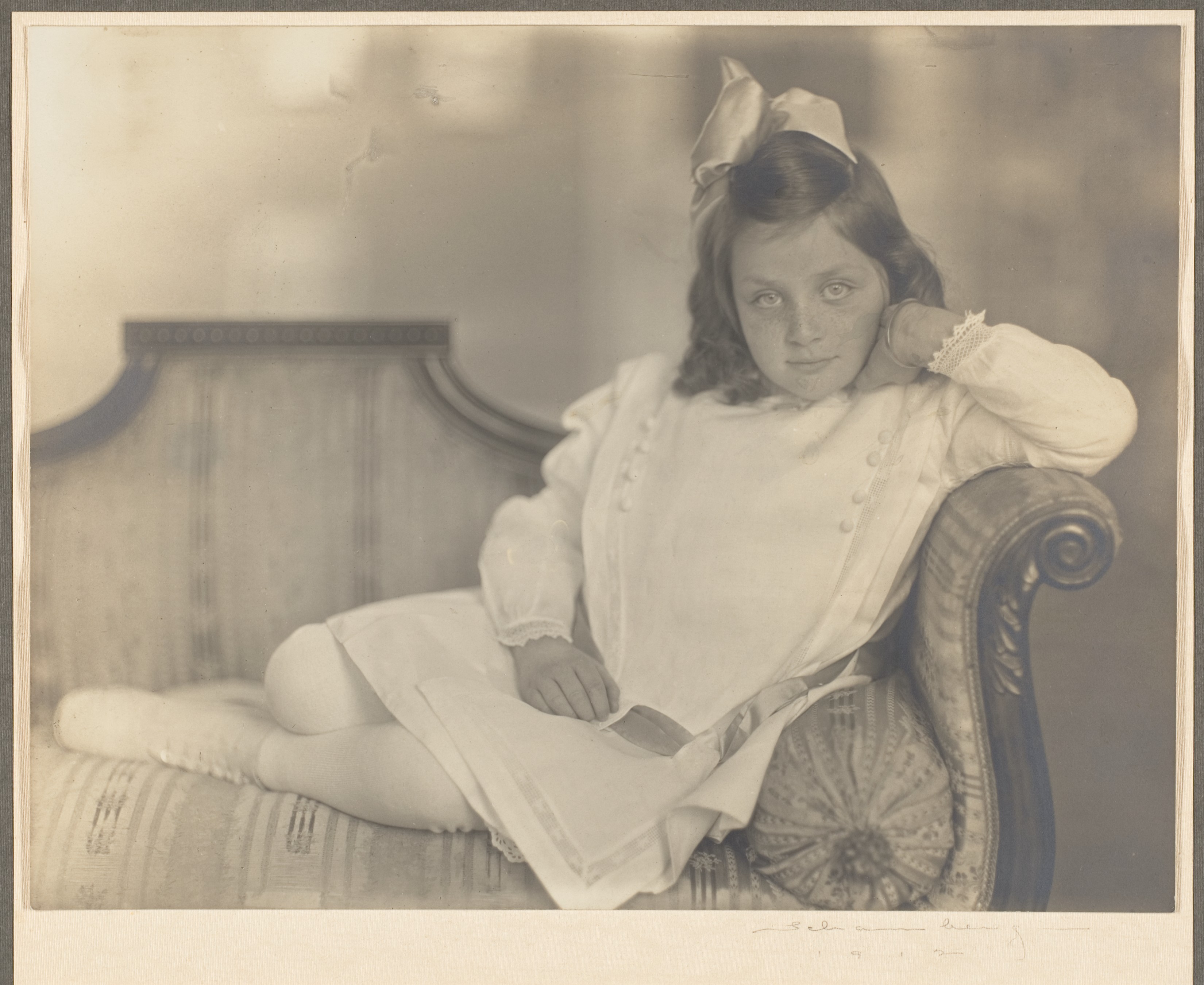 Vintage Portrait of Young Girl on Sofa