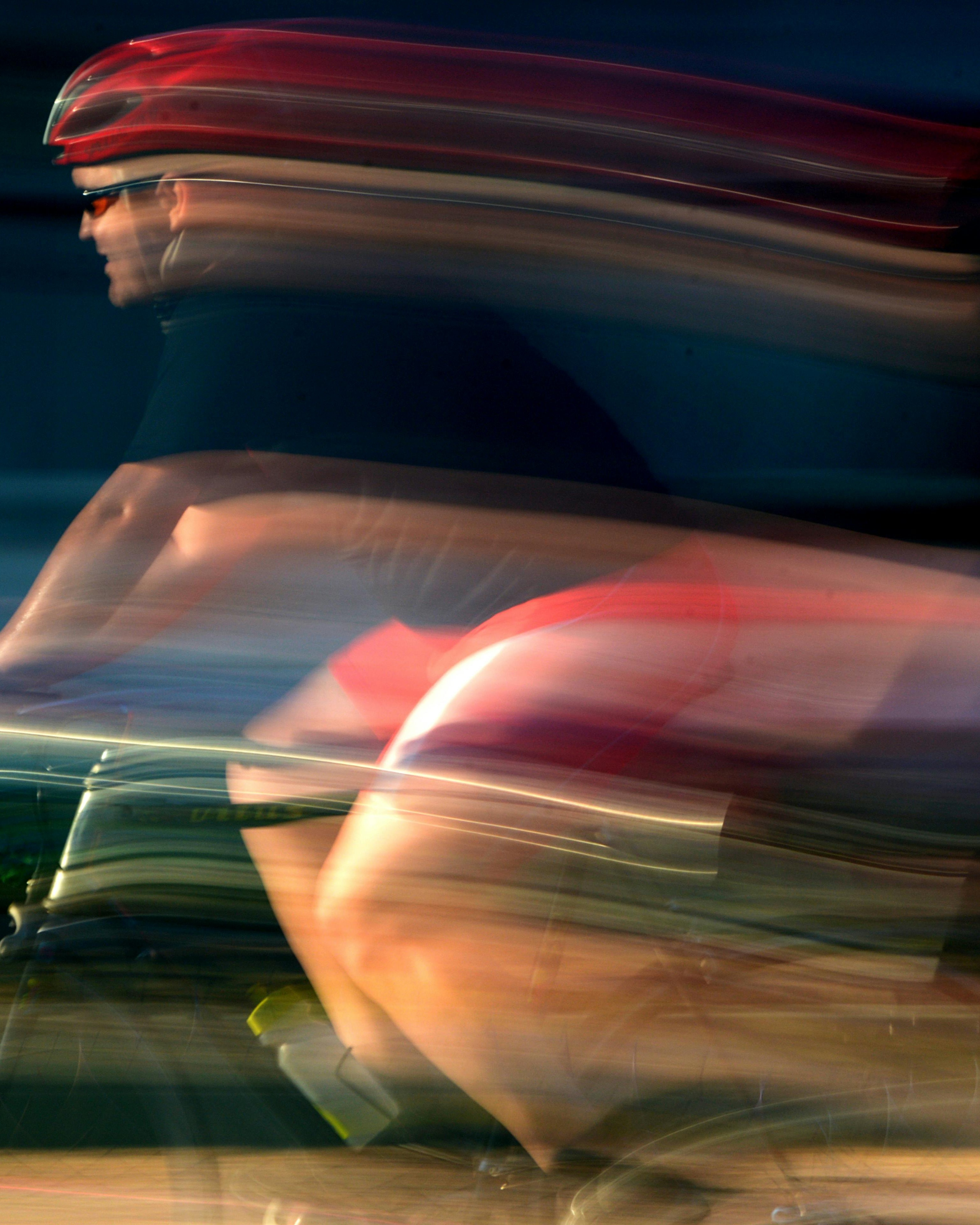 Blurred Speeding Cyclist in Motion