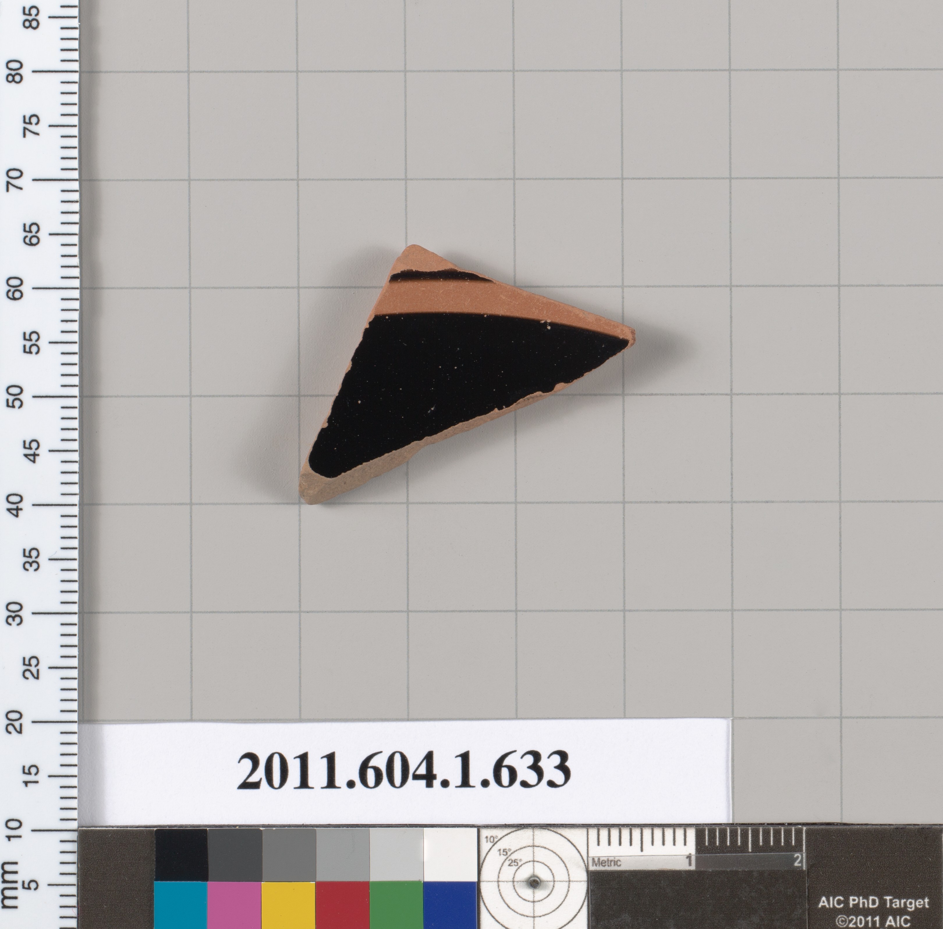 Triangular Pottery Shard Specimen